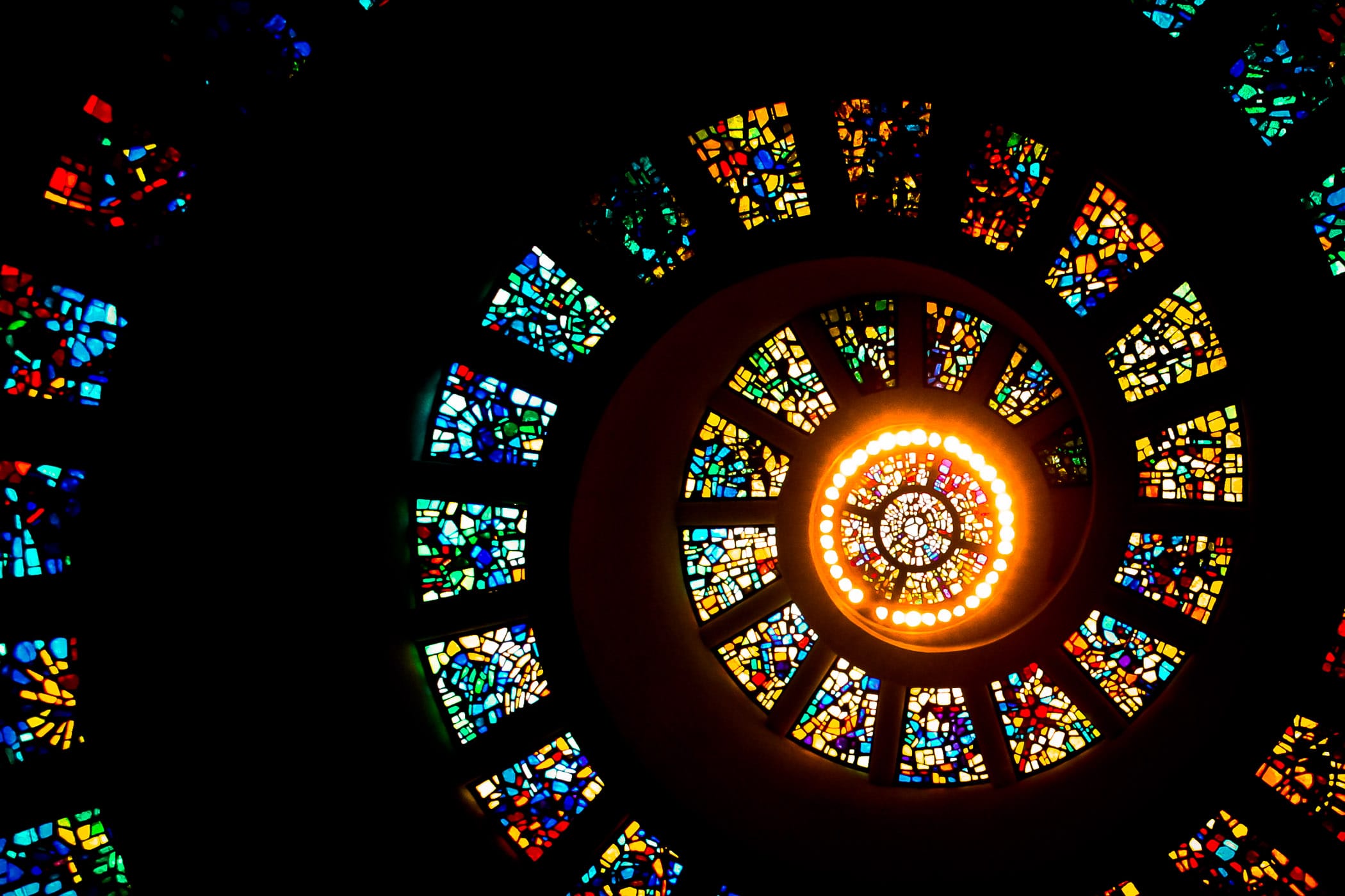 The stained-glass window on the ceiling of the chapel at Thanks-Giving Square in Downtown Dallas.
