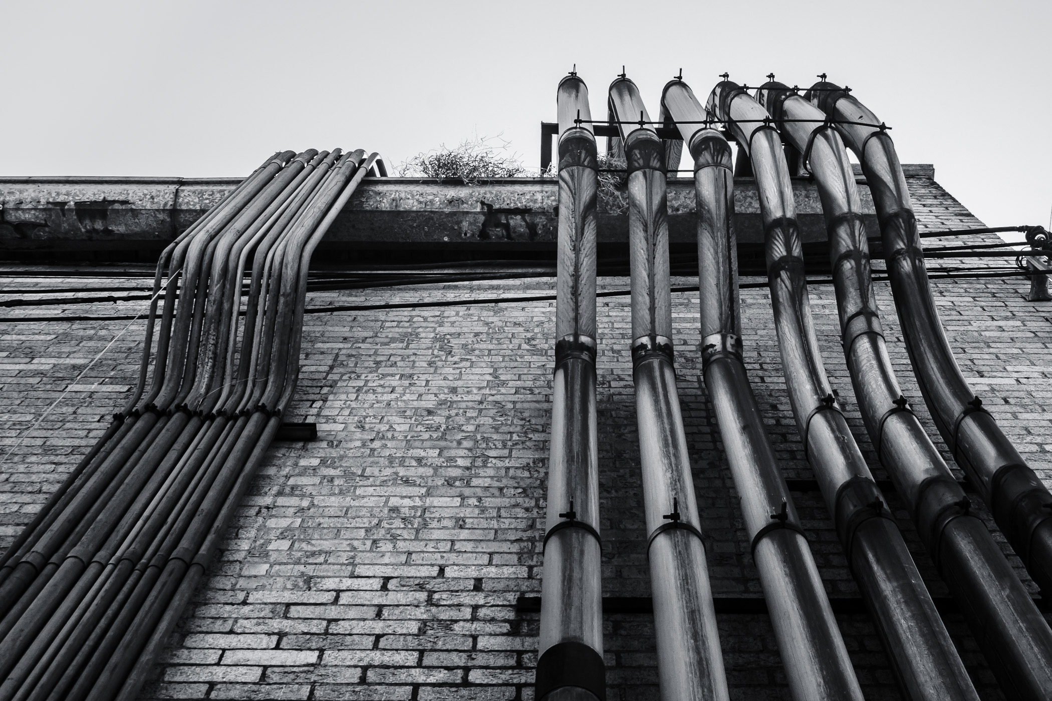 Electrical conduits on an old building in Downtown Henderson, Texas.