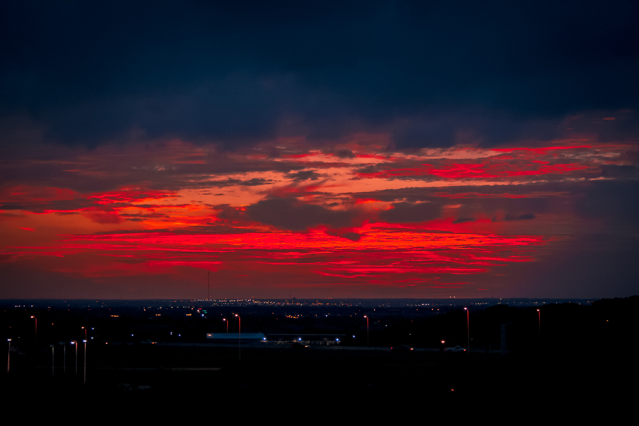 The sun setting over Dallas County, Texas.