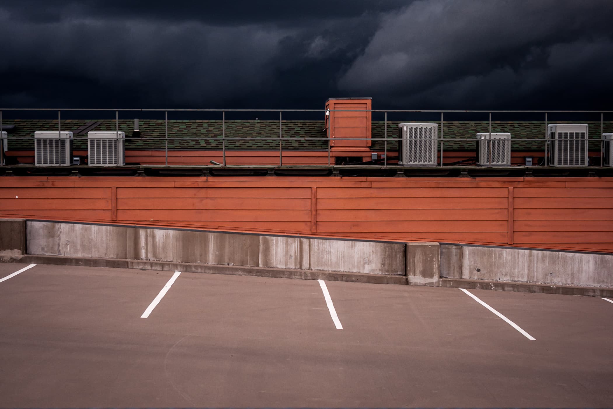 Storm clouds rolling into Collin County, as seen from the Eastside Village parking garage in Downtown Plano, Texas.