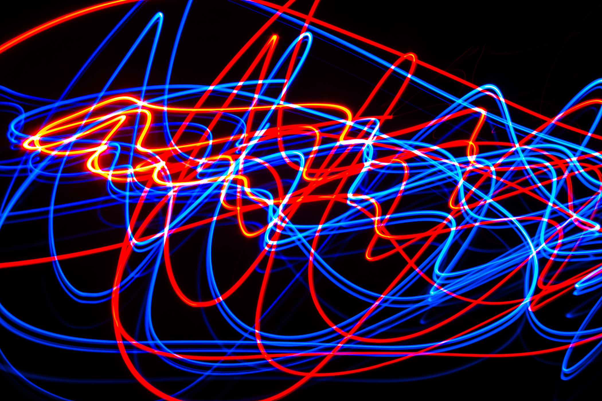 I was playing around with LEDs, a candle, a dark room and long exposures again and came up with this.