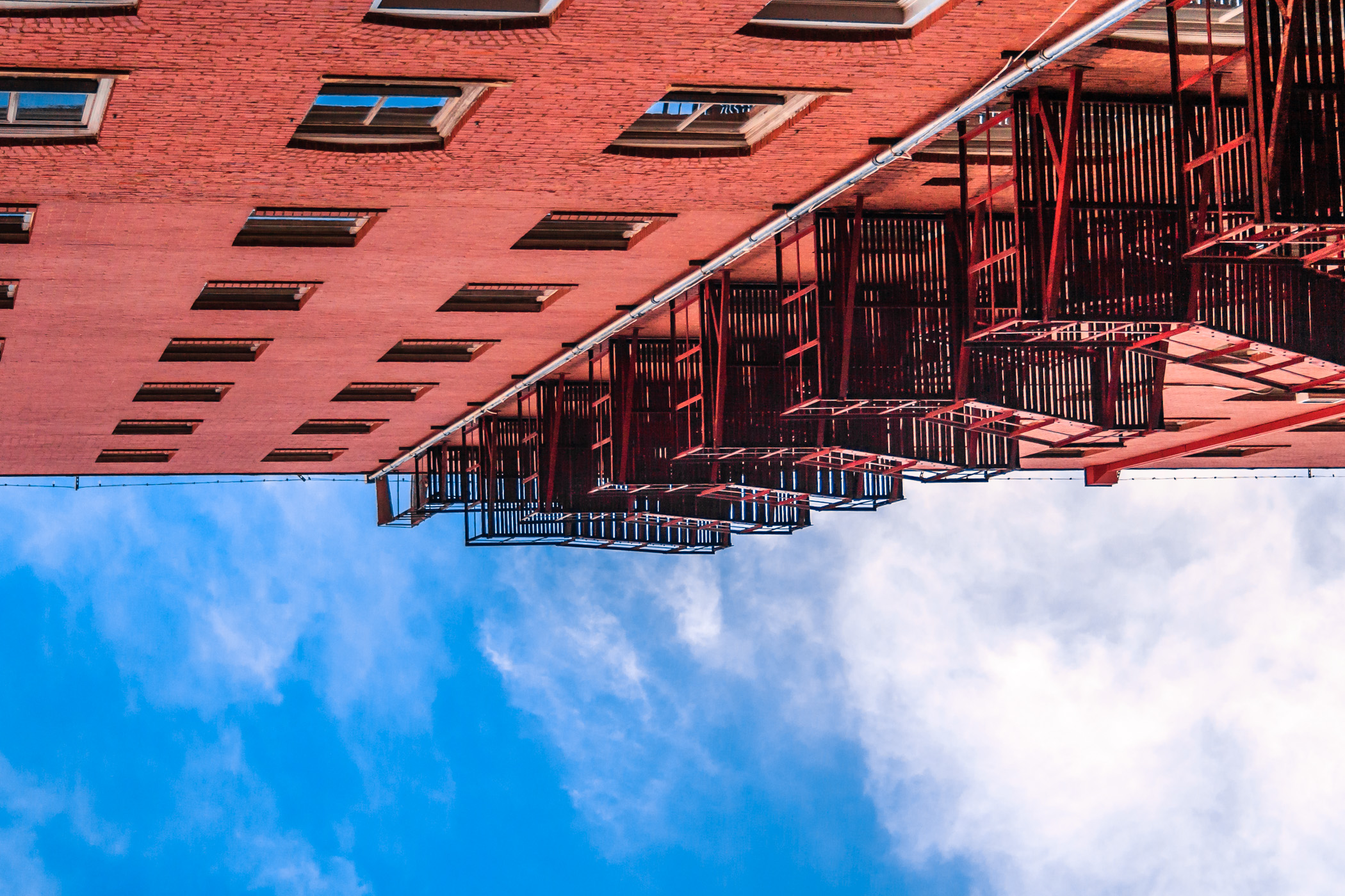 A fire escape climbs up the side of a building in Wichita Falls, Texas.