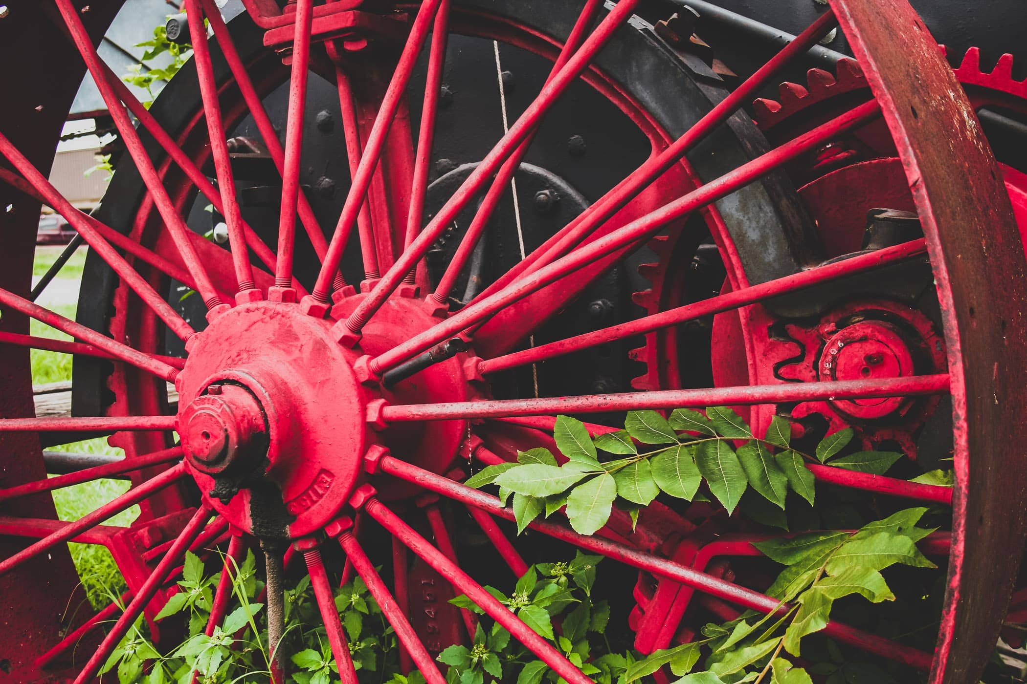 The wheel of an antique tractor found in Marietta, Oklahoma.