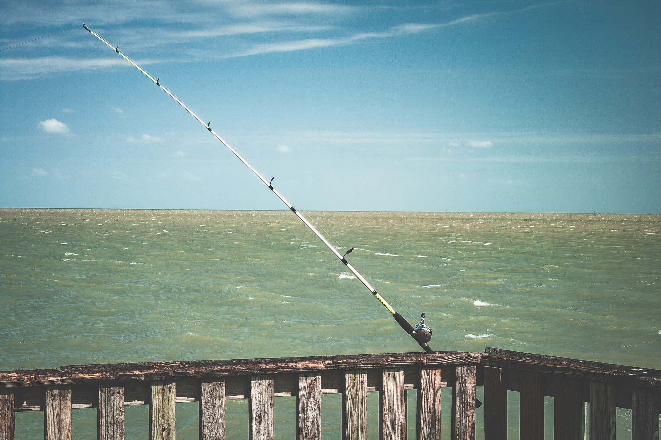 A fishing pole on a Port Isabel, Texas pier.