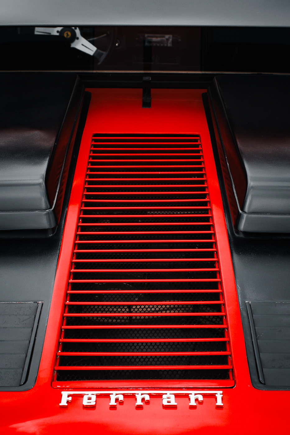 A Ferrari Berlinetta Boxer's engine cover at Dallas' All British and European Car Day.