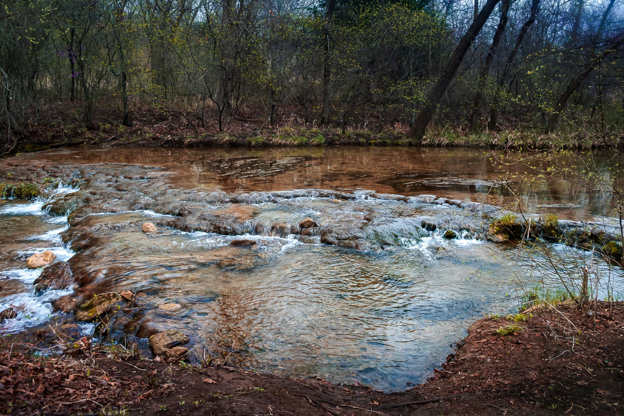 Miniature waterfalls in a stream at Turner Falls Park, Oklahoma.