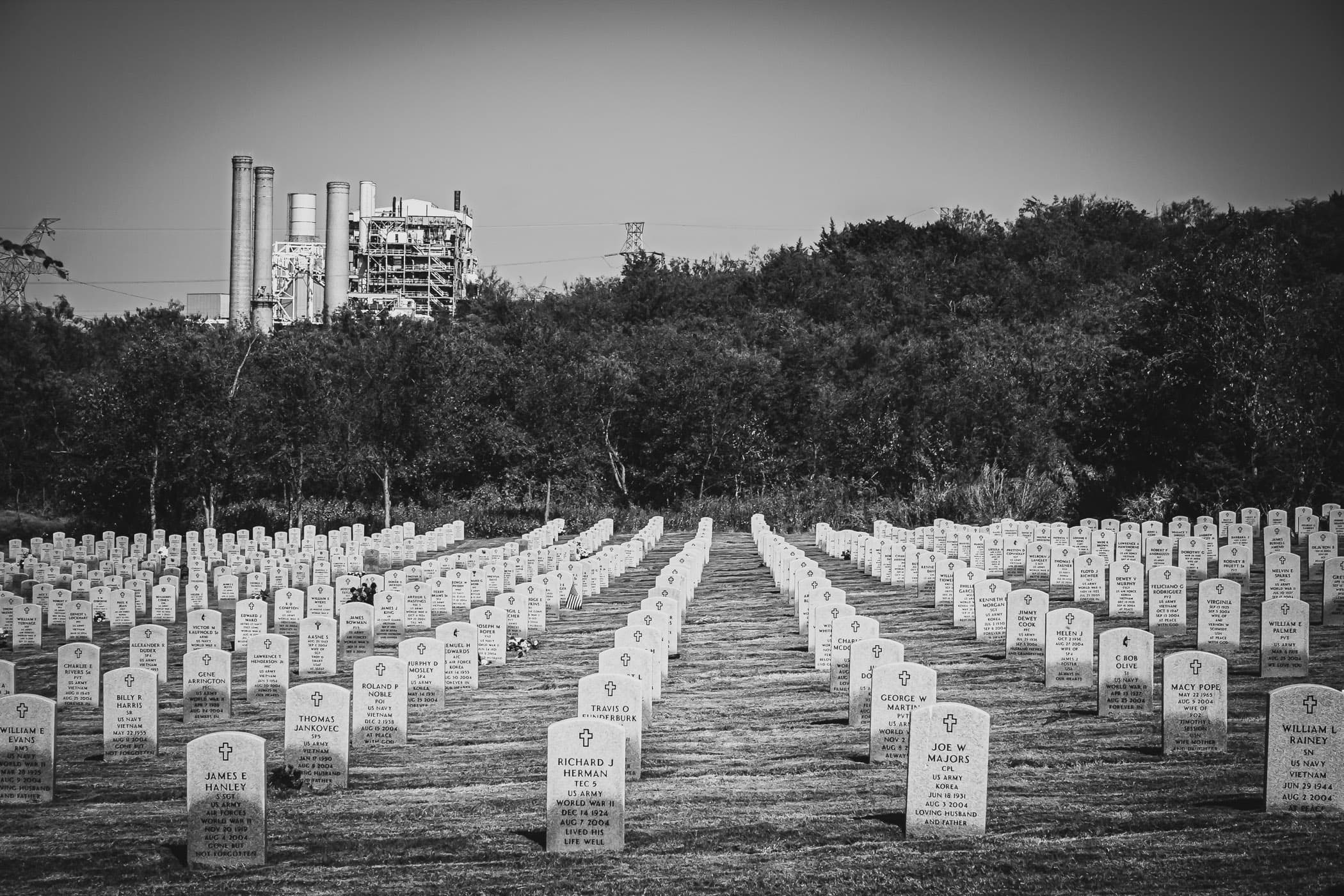 TXU's Mountain Creek Power Plant looms over Dallas National Cemetery.