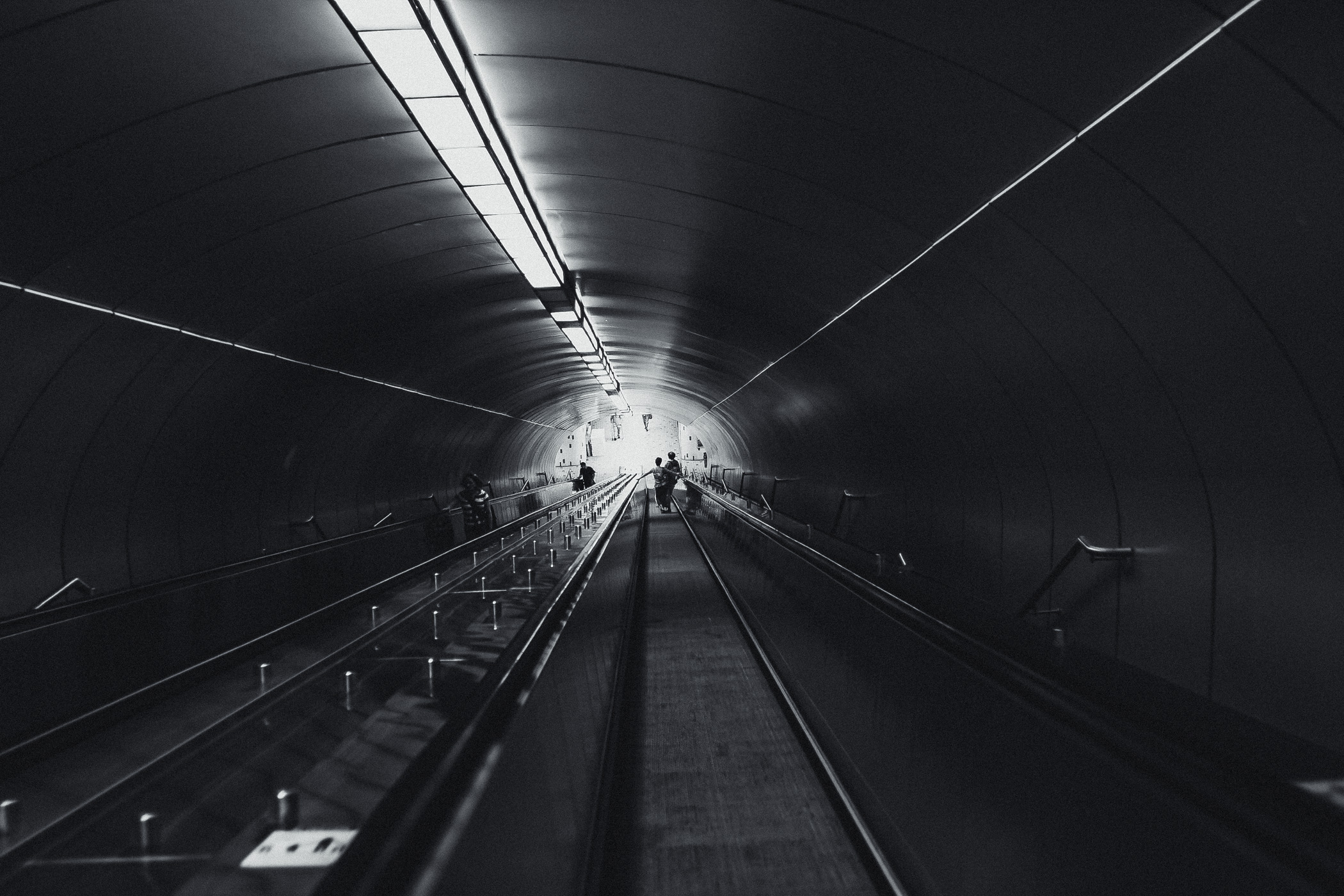 An inclined people mover leads to the bowels of Montréal's Beaudry metro station.