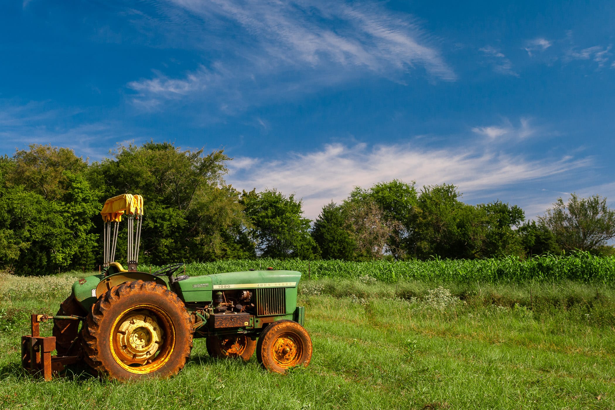 An old John Deere tractor at Moore Farms in Bullard, Texas.