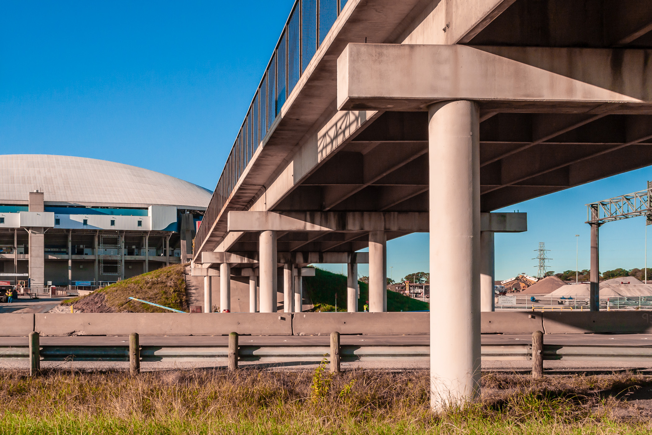 This pedestrian bridge crosses a busy road to the soon-to-be-demolished Texas Stadium.