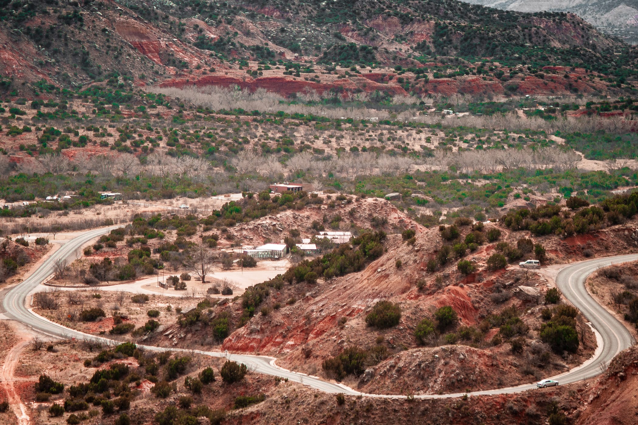 Park Road 5 descends more than 800 feet to the bottom of Palo Duro Canyon, Texas.