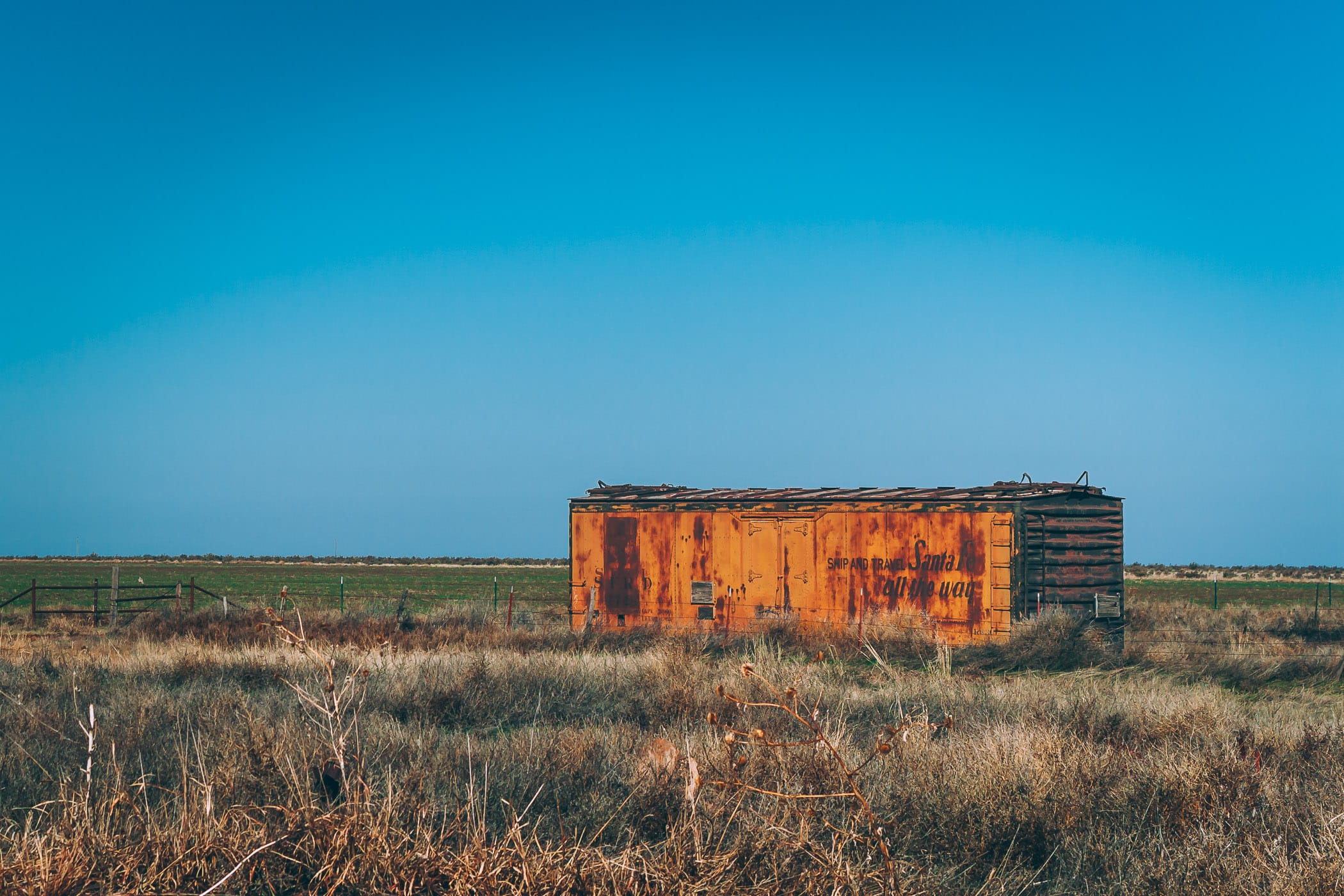 An abandoned boxcar in a field somewhere in the Texas Panhandle.