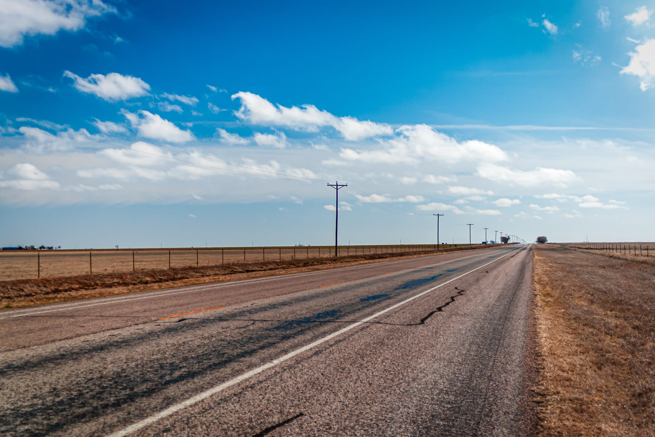 A road leads to the distant horizon in the Texas Panhandle near Canyon.
