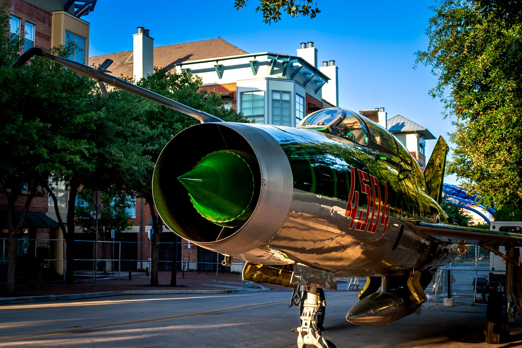 A Yugoslav variant of the MiG-21 "Fishbed"—the MiG-21U-400 "Mongol"—belonging to Addison, Texas' Cavanaugh Flight Museum sits in the street for Taste Addison.