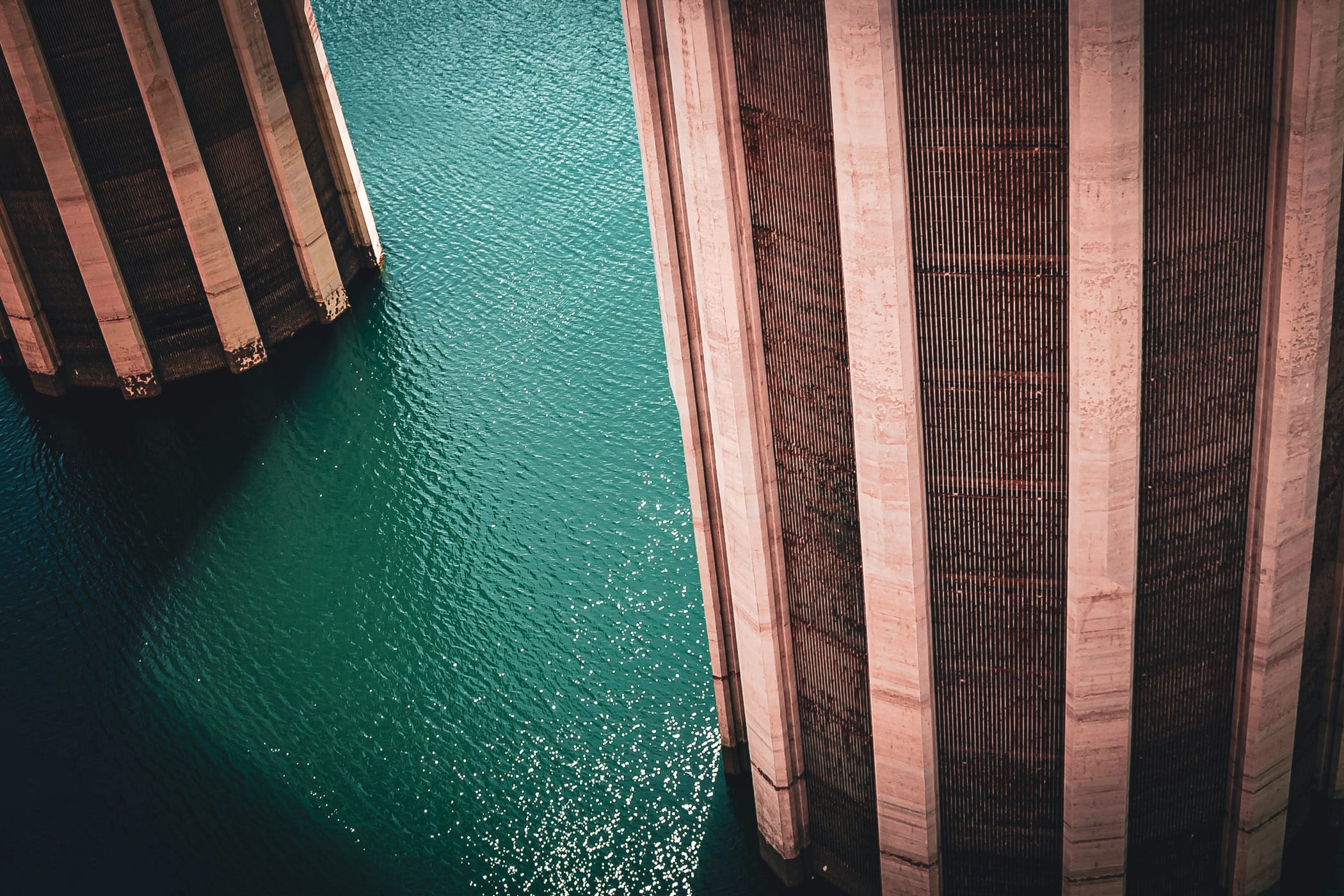 The two 395-feet-tall water intake towers rise out of the water on the Nevada side of Hoover Dam. Two nearly-identical towers are also on the Arizona side.