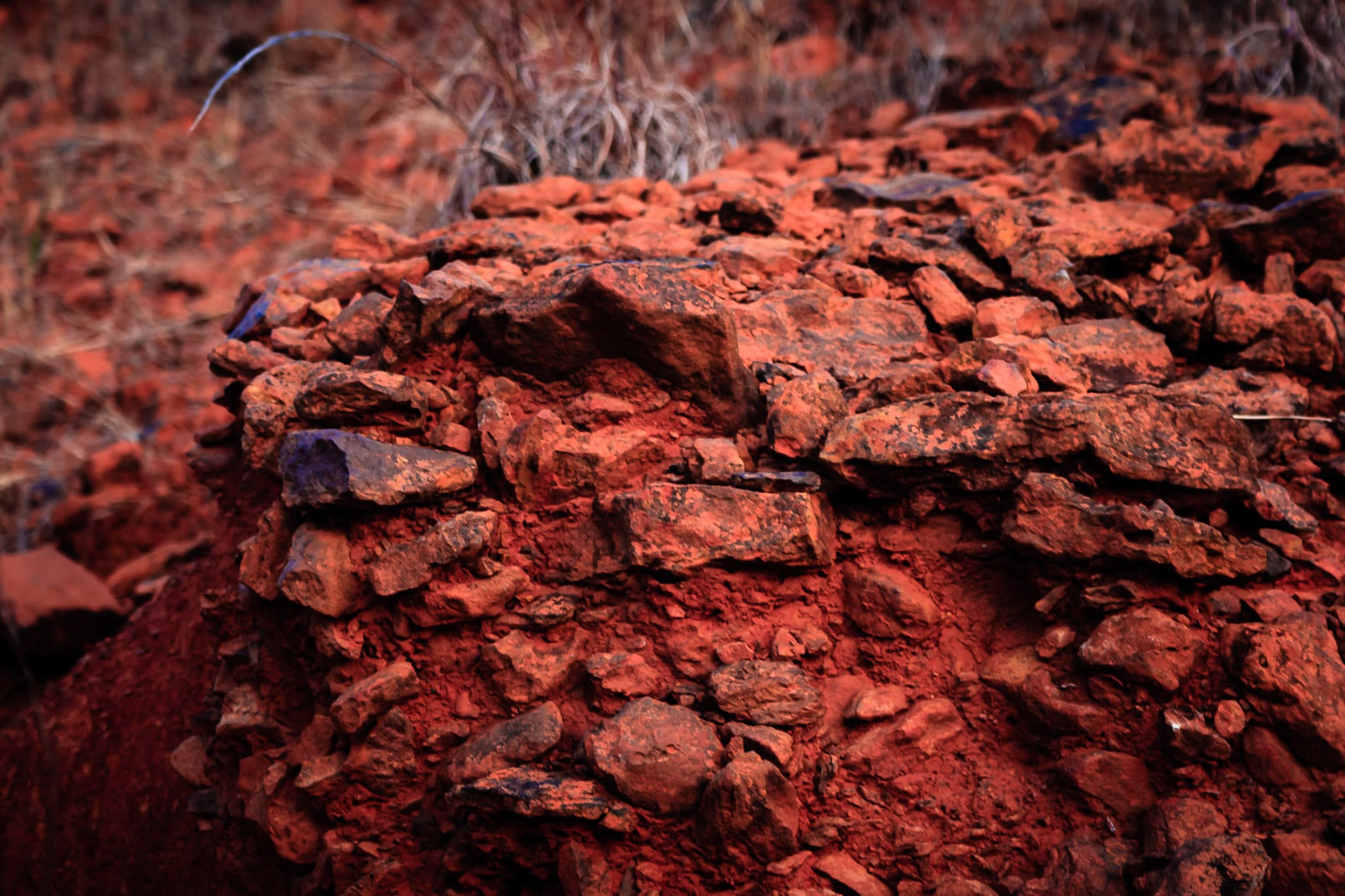 Red clay and rocks at a construction site in Tyler, Texas.