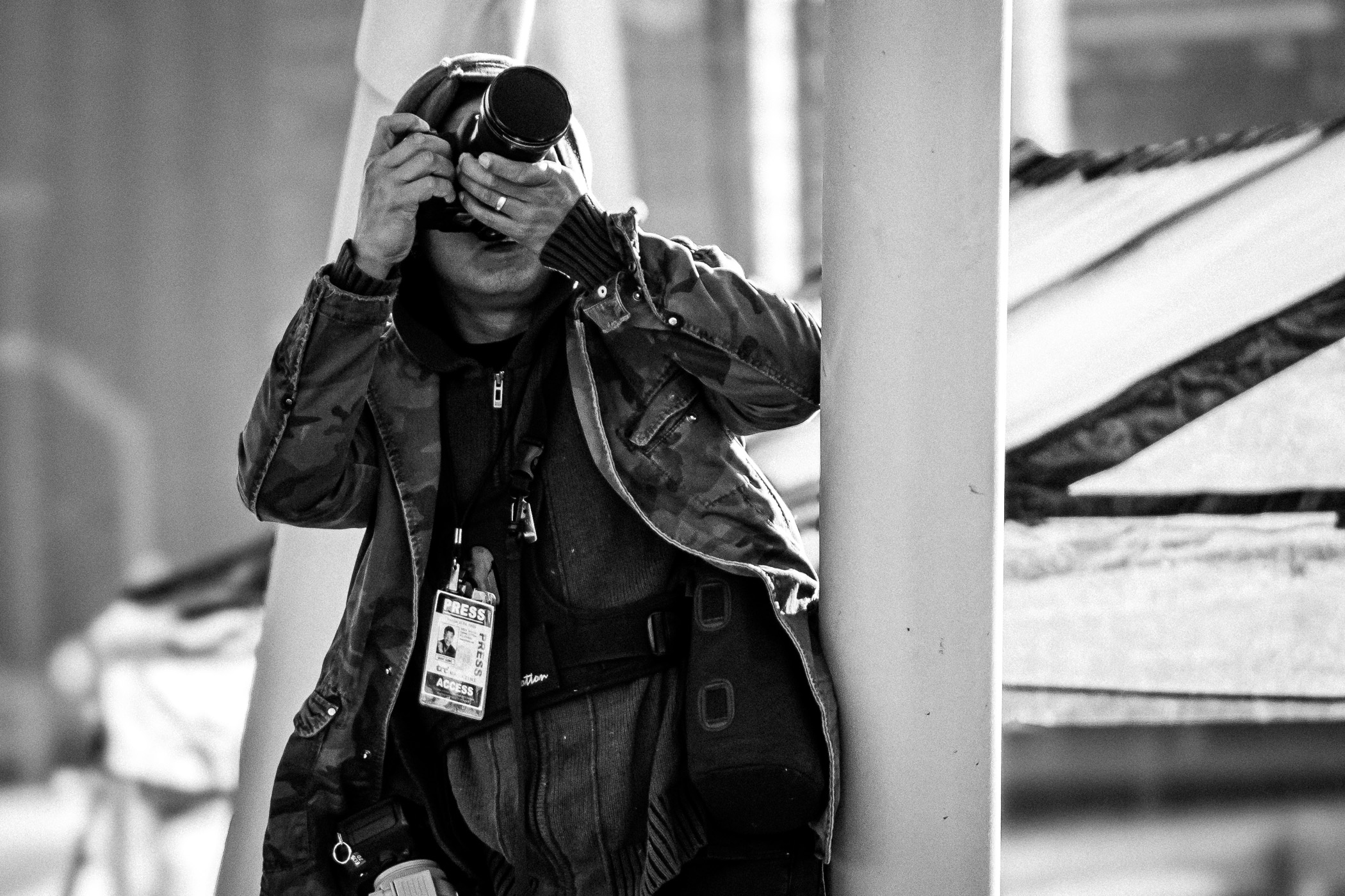 A photographer for a local publication at the dedication of Dallas' Margaret Hunt Hill Bridge.