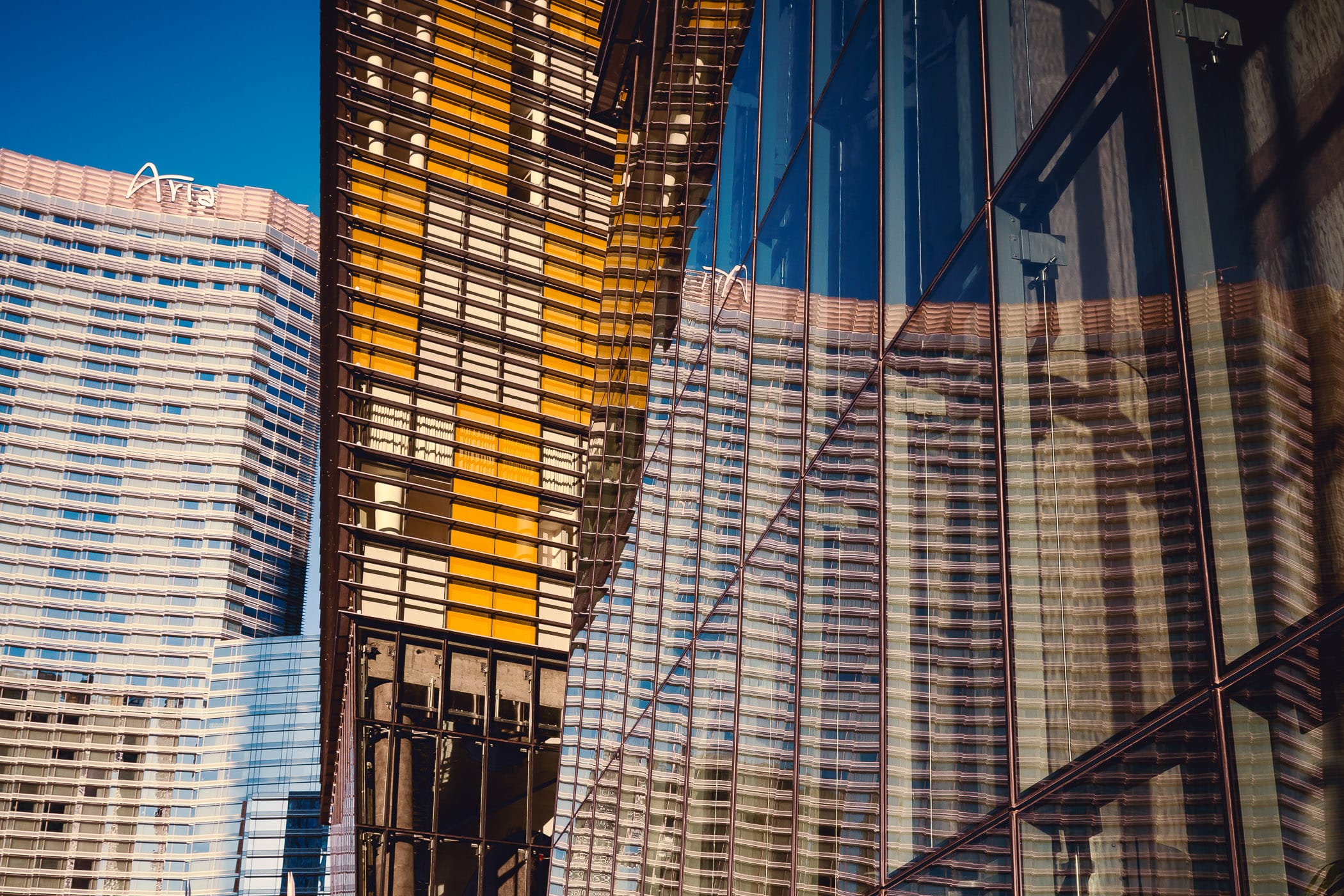 The Aria reflected in the lower level windows of the west Veer Tower, CityCenter, Las Vegas.