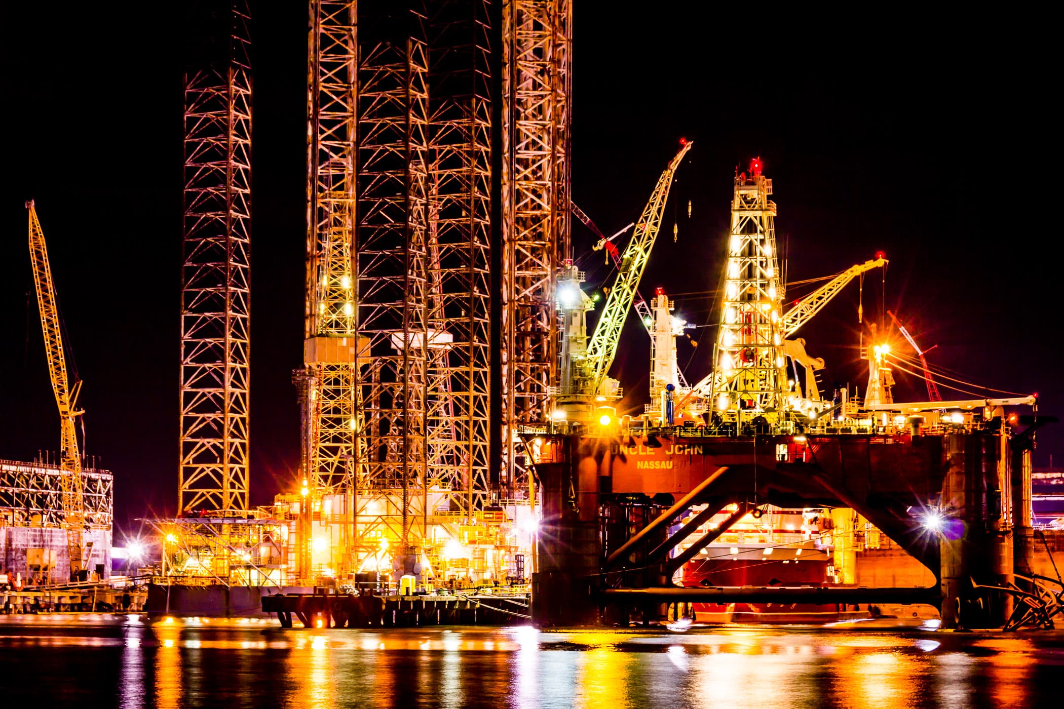 Offshore oil platforms in graving docks at Pelican Island, Galveston, Texas.