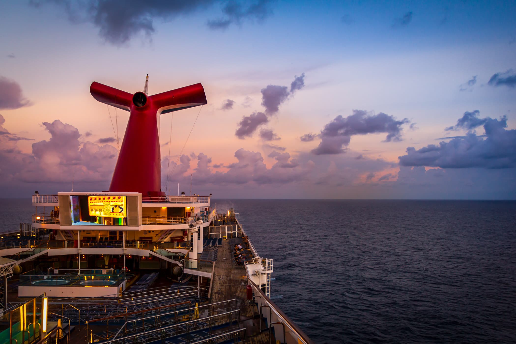 Morning twilight lights the Carnival Triumph as she sails through the Gulf of Mexico.