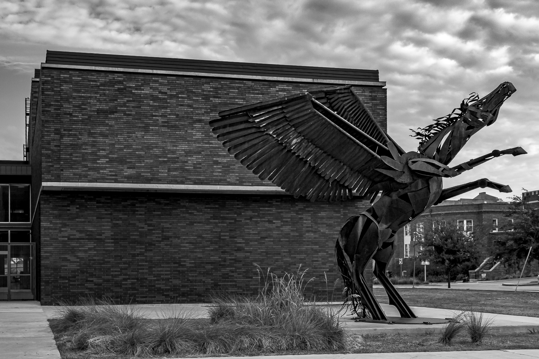 An abstract sculpture of Pegasus outside of the Dallas Arts District's Booker T. Washington High School for the Performing and Visual Arts.