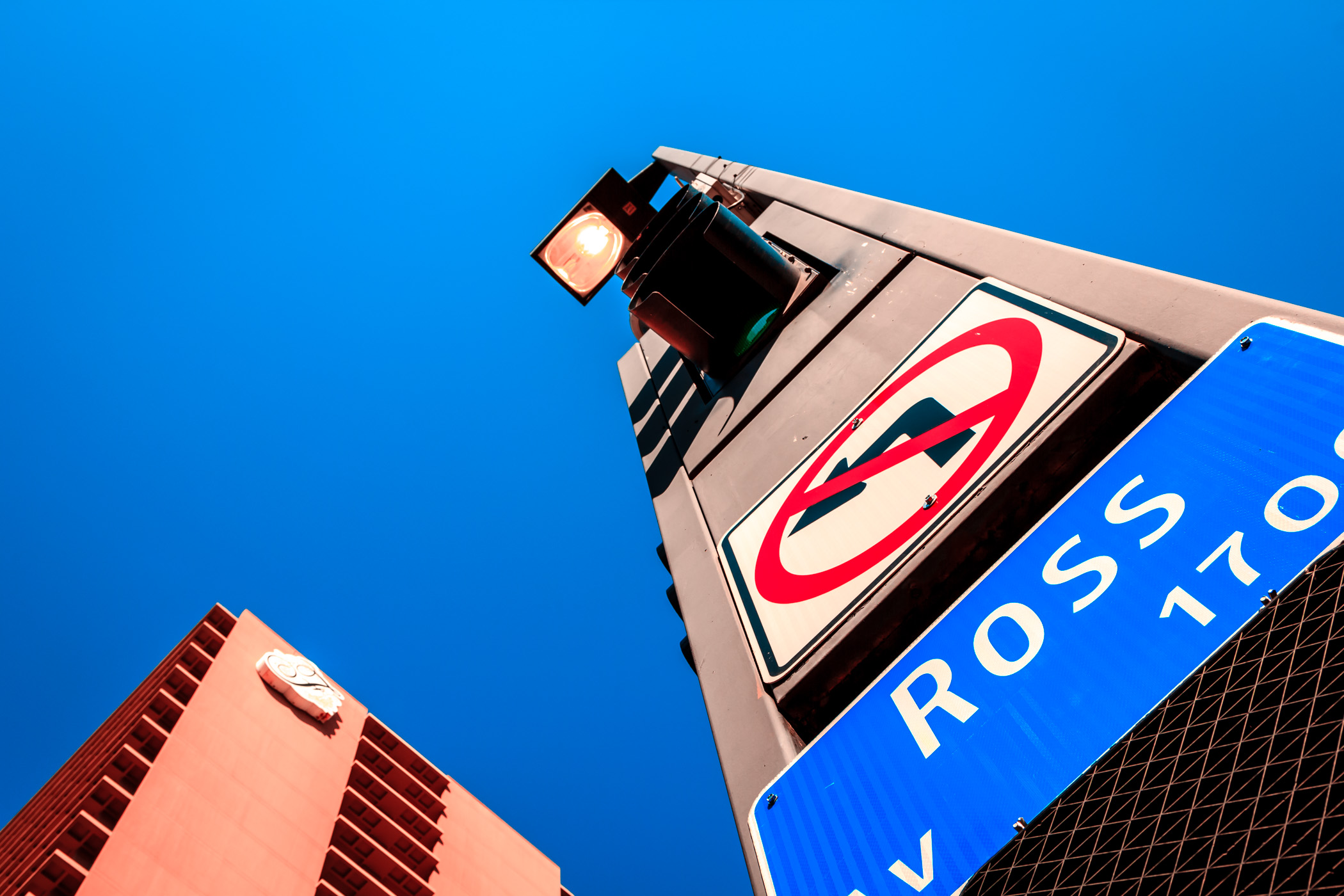 The south tower of the Fairmont Hotel rises over the intersection of Ross Avenue, Ervay Street, and North Ackard Street in Downtown Dallas.