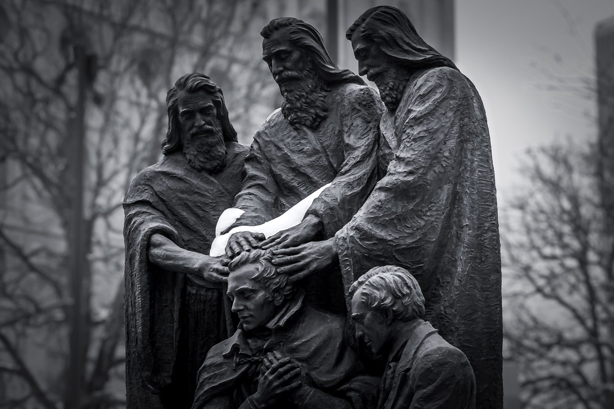 A bronze statue in Salt Lake City, Utah's Temple Square depicting Peter, James and John in the act of conferring the Melchizedek priesthood to Joseph Smith and Oliver Cowdery, founders of the Latter Day Saints movement.