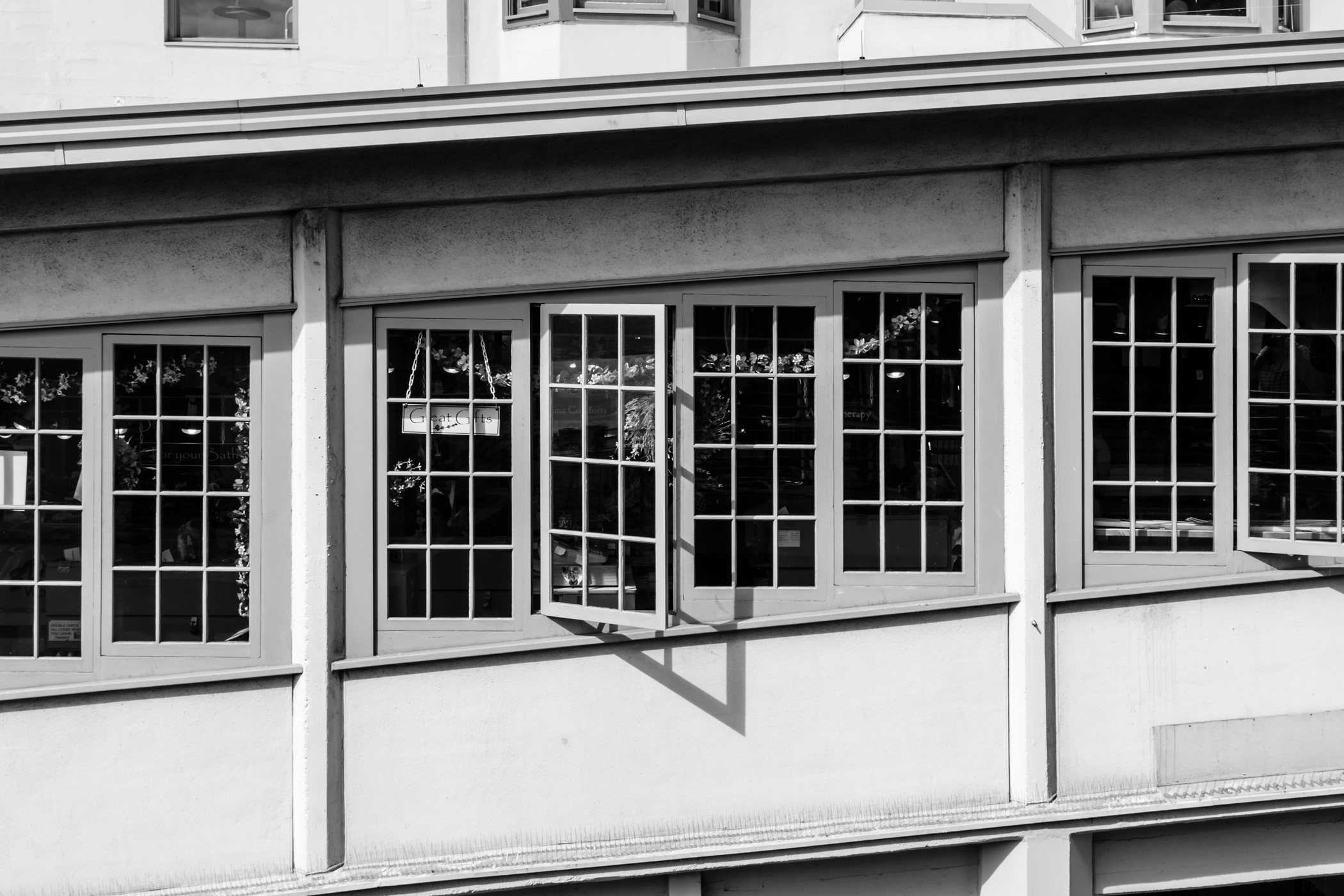 Windows built into a sloped part of a building at Seattle's Pike Place Market.