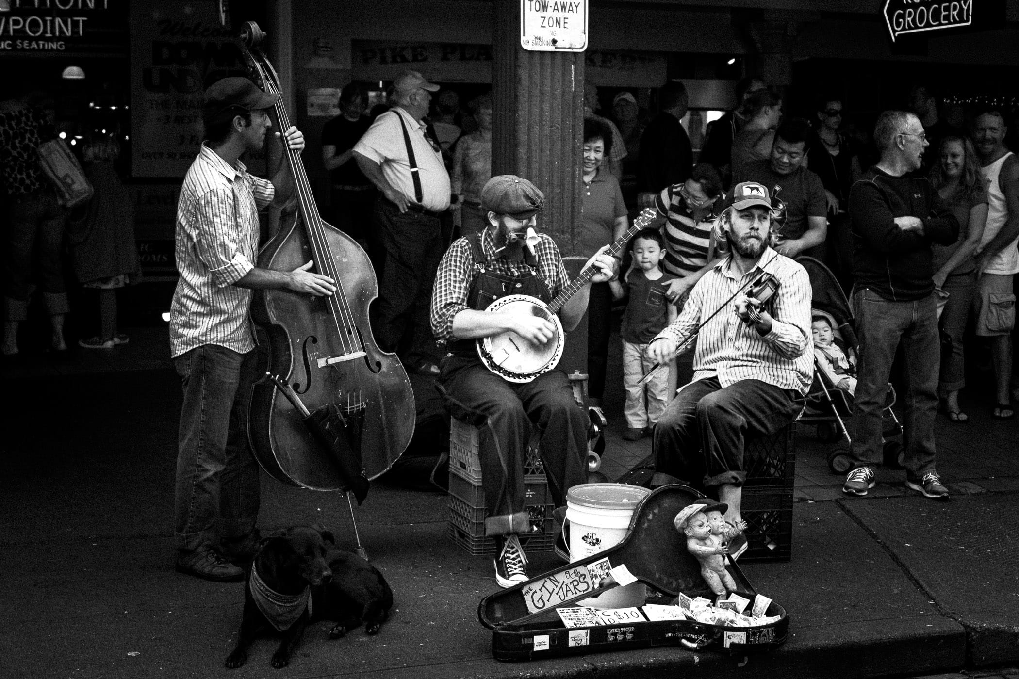 Blues & Jazz trio The Gin Jars busk for tips at Seattle's Pike Place Market.