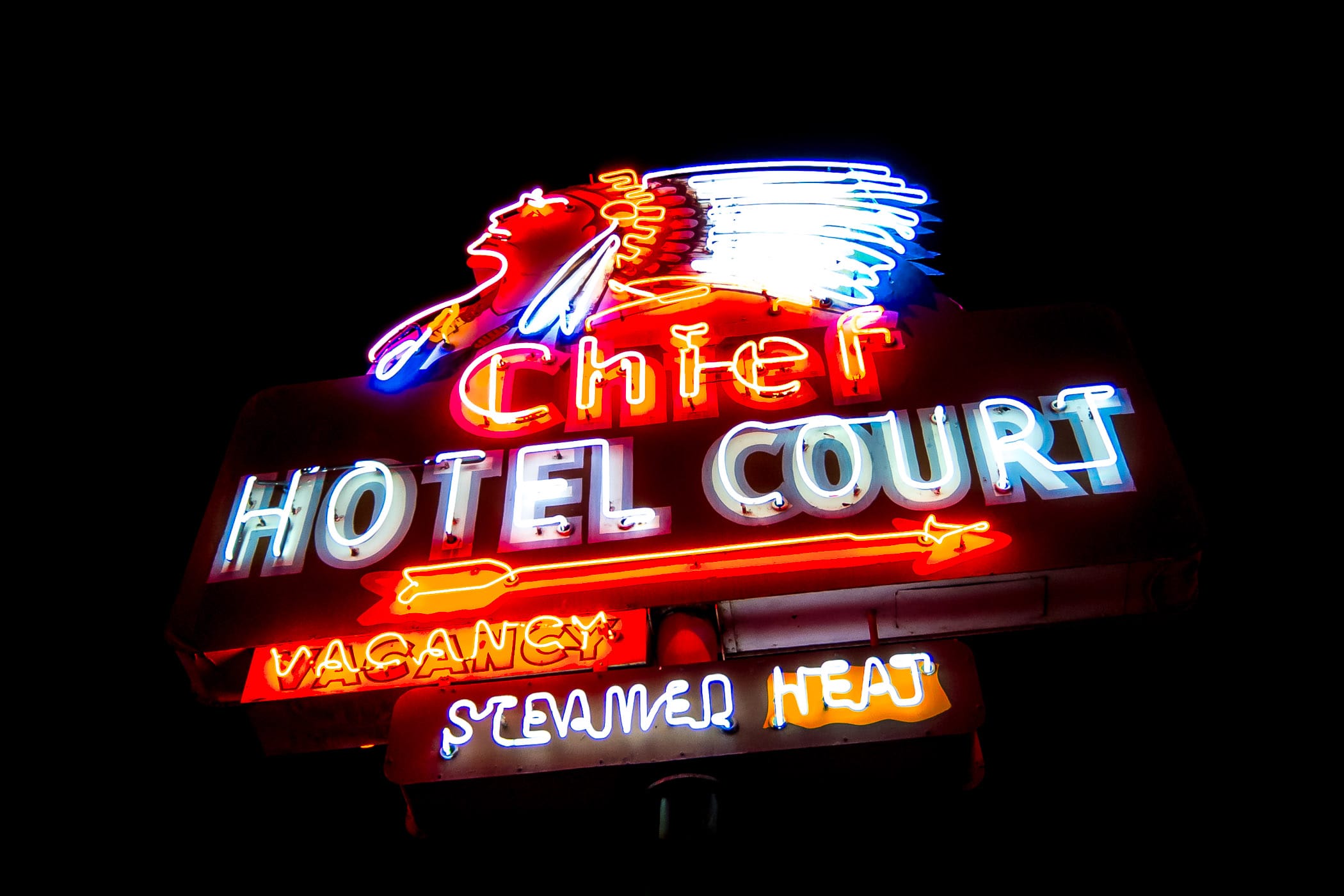 This striking neon sign for Las Vegas' long-gone Chief Hotel Court was erected in 1940. Since 1997, it's been a part of the collection of the Neon Museum and stands at the northeast corner of Fremont Street and 4th Street in Downtown Las Vegas.