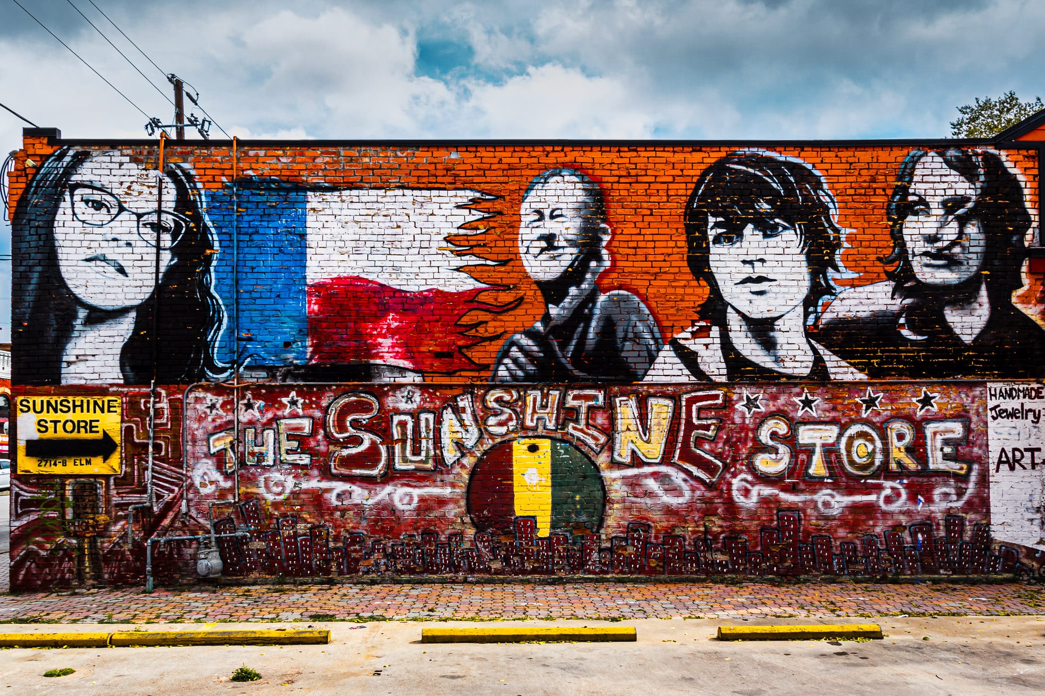 A mural on the outside of The Sunshine Store in Dallas' Deep Ellum neighborhood.