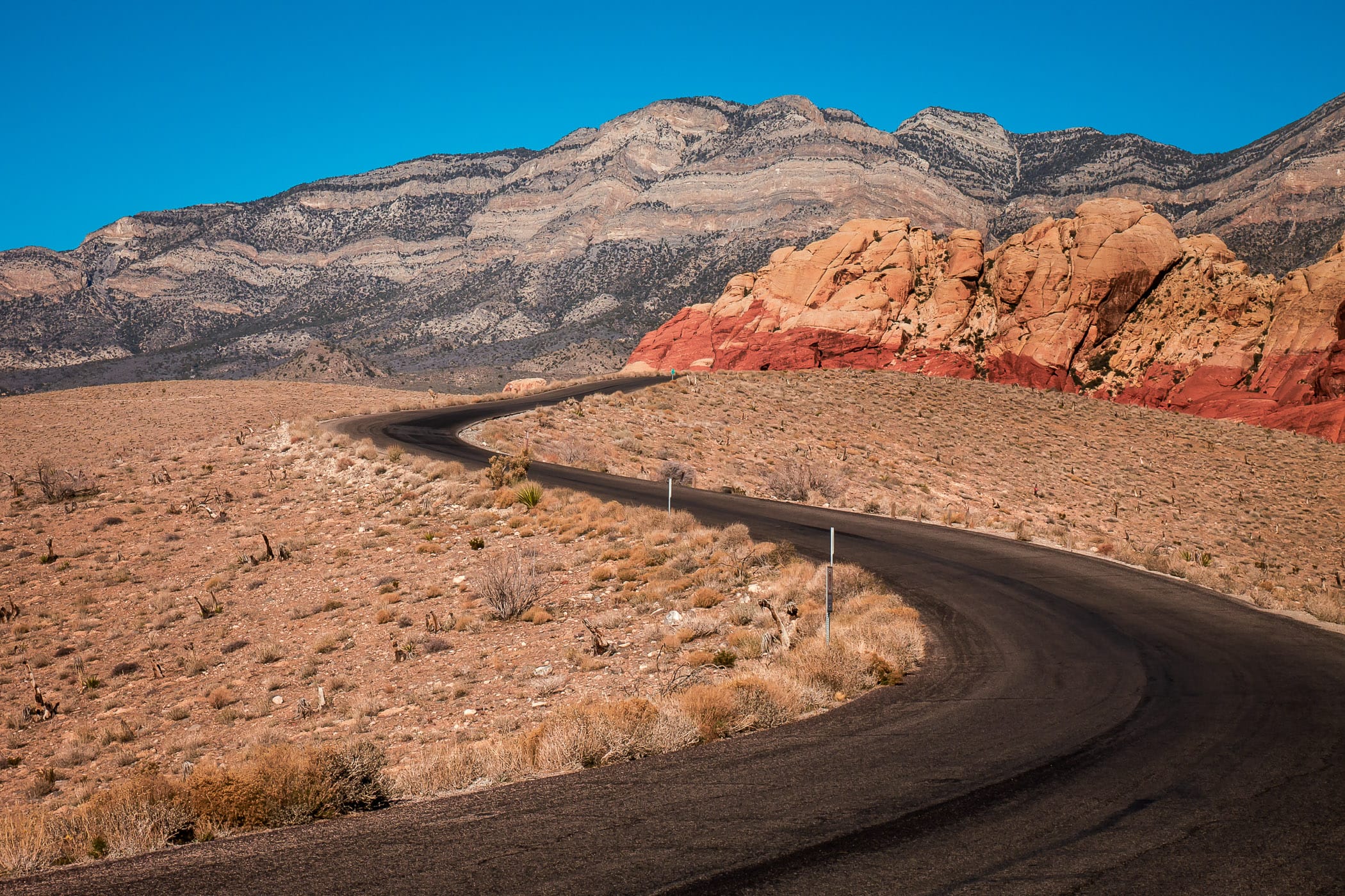 Red Rock Canyon National Conservation Area's Scenic Loop Drive snakes through the Nevada desert.