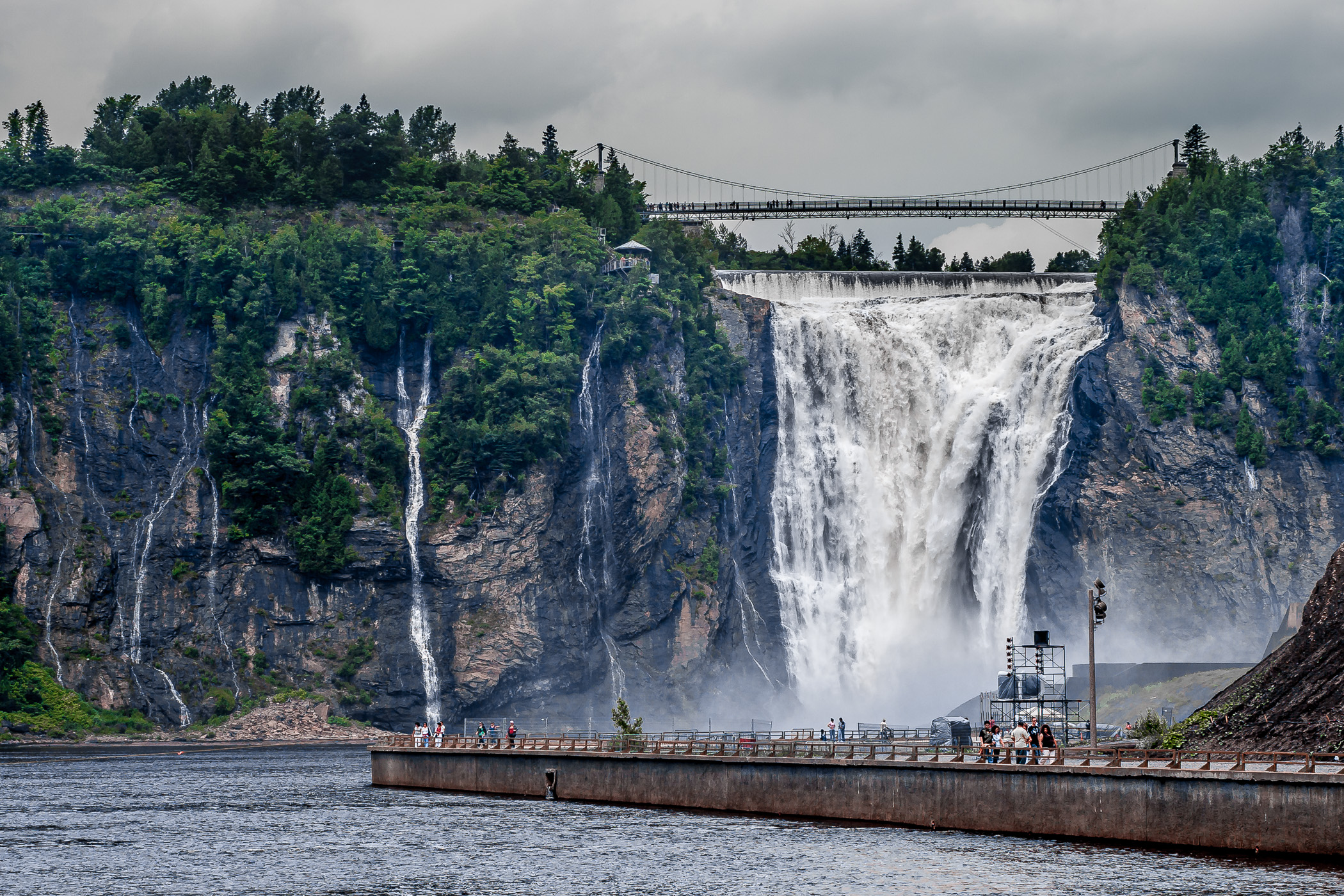 Quebec's Montmorency Falls drop 275 feet (84 meters) where the Montmorency River meets the Saint Lawrence River near Quebec City.