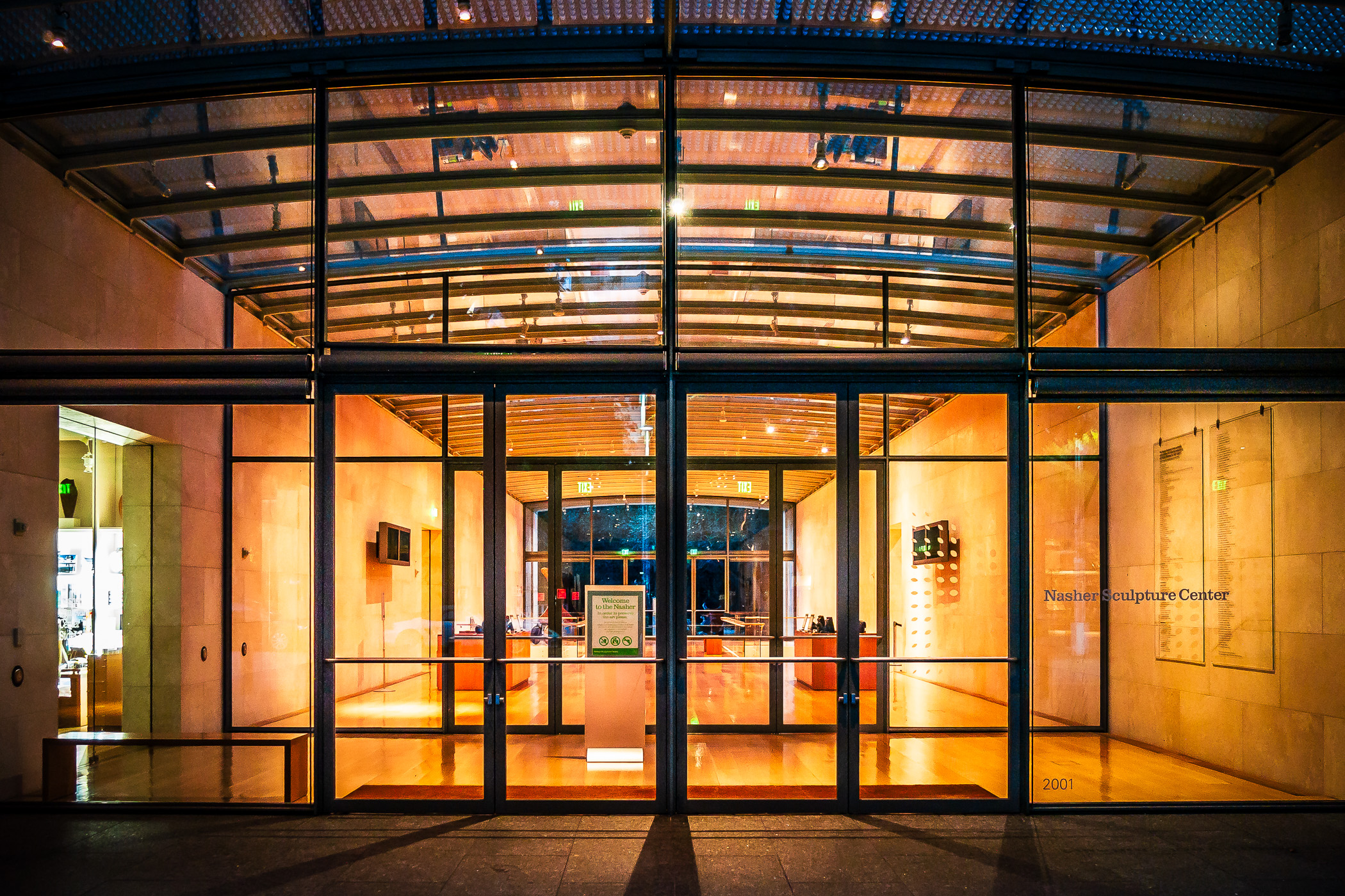 The entrance and lobby to Dallas' Nasher Sculpture Center, empty of patrons after closing time.