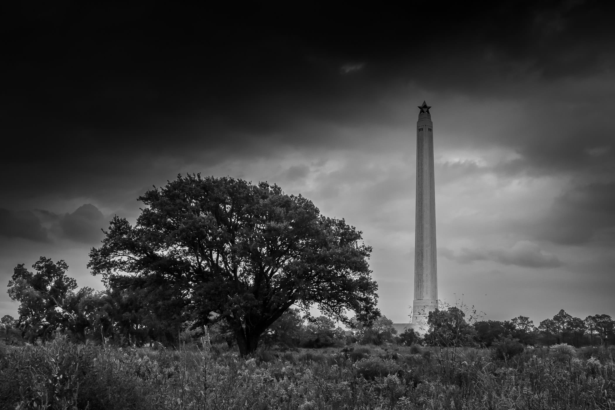 Texas' San Jacinto Monument—a 567-foot-tall granite column that commemorates the Battle of San Jacinto during the Texas Revolution—rises above the surrounding fields along the Houston Ship Channel.