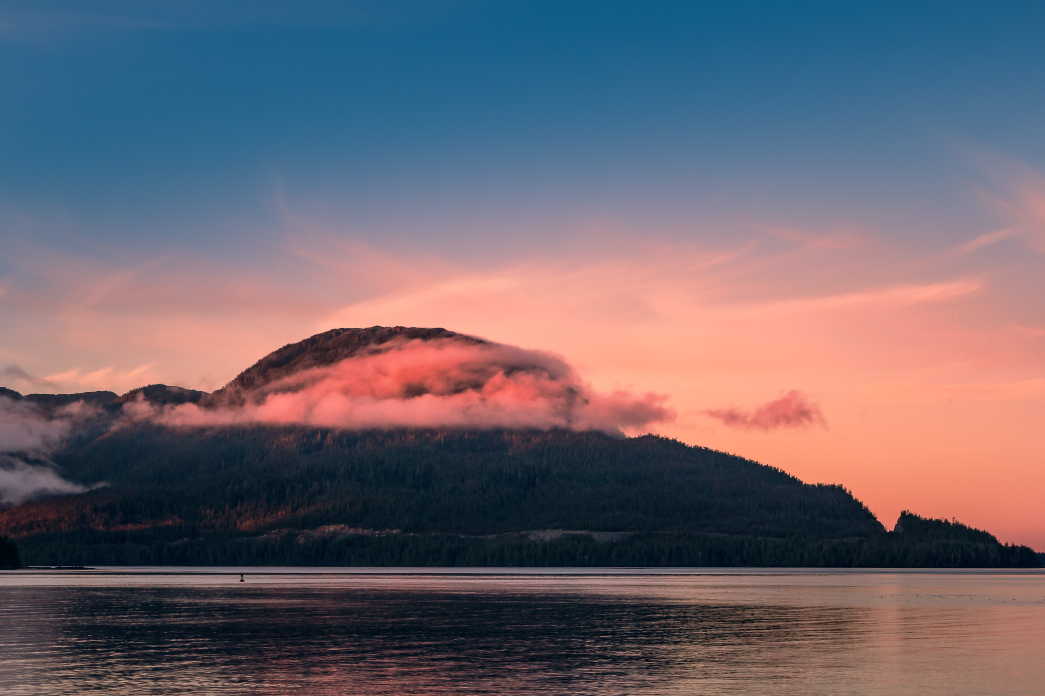 Early-morning fog wraps around the southern tip of Gravina Island, just across the Tongass Narrows from Ketchikan, Alaska.