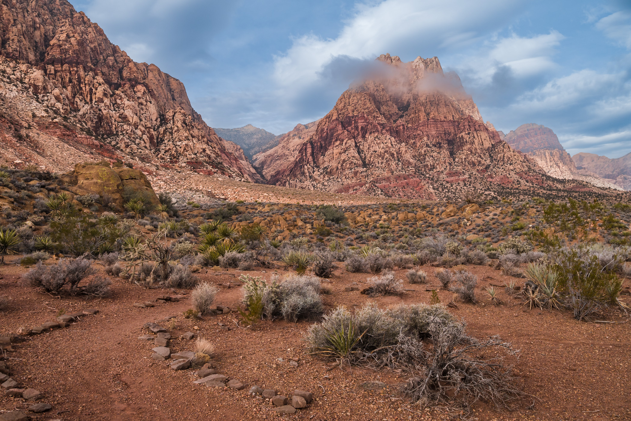 Clouds wrap around a rocky pinnacle in the Spring Mountains outside of Las Vegas.