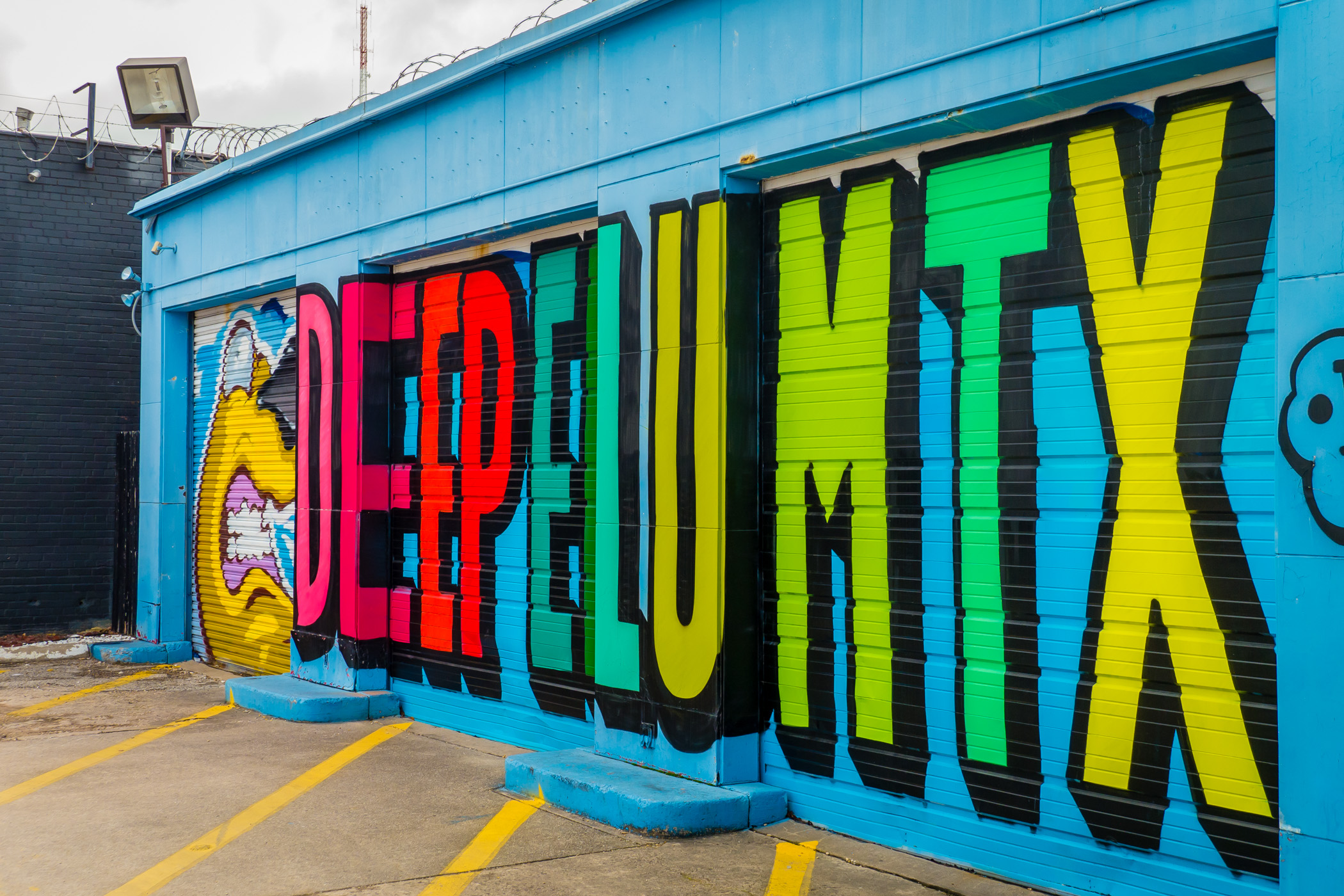 A colorful mural on a building in Dallas' Deep Ellum neighborhood.
