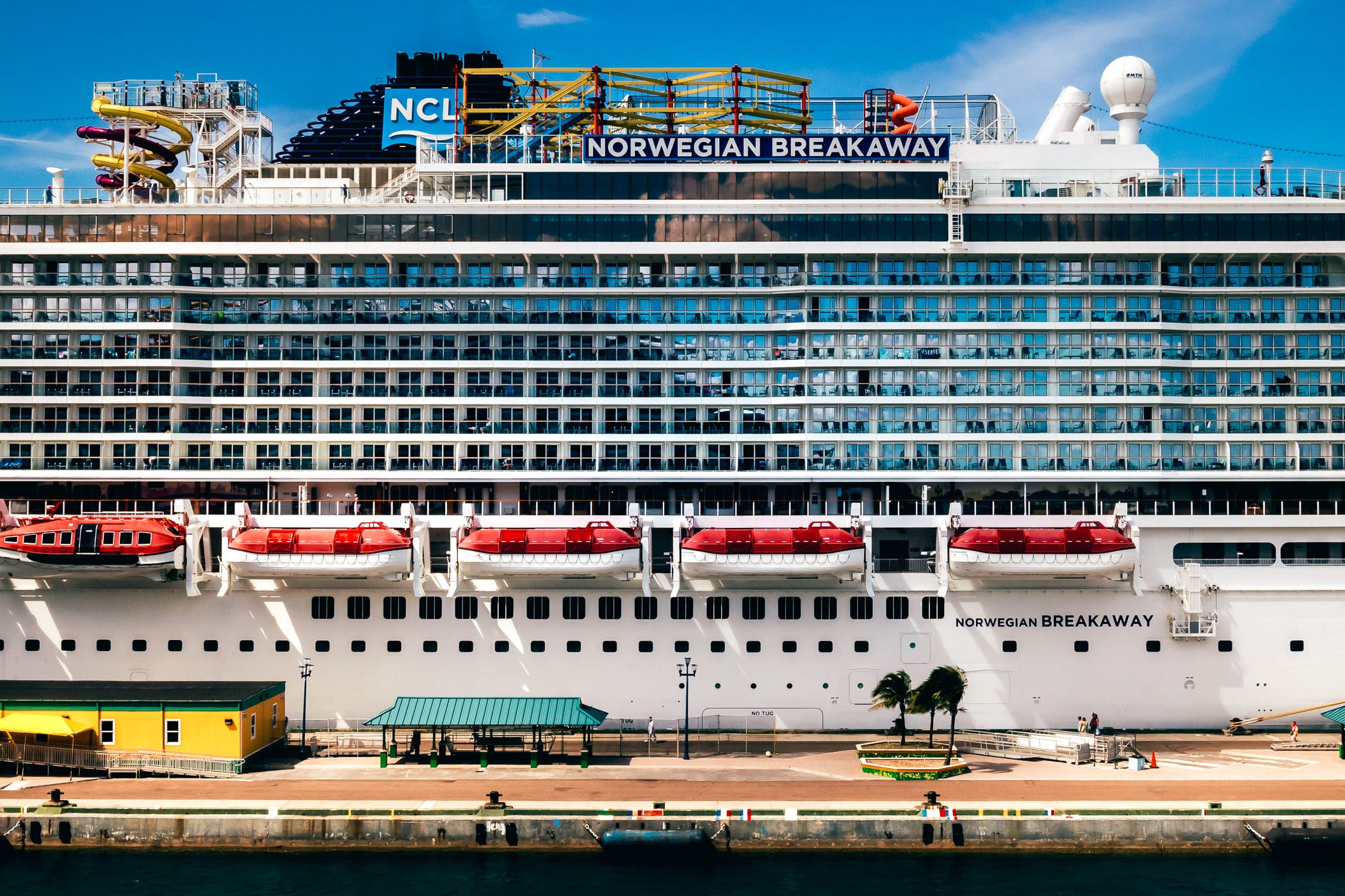 Detail of the midsection of the cruise ship Norwegian Breakaway, docked at a pier in Nassau, Bahamas.