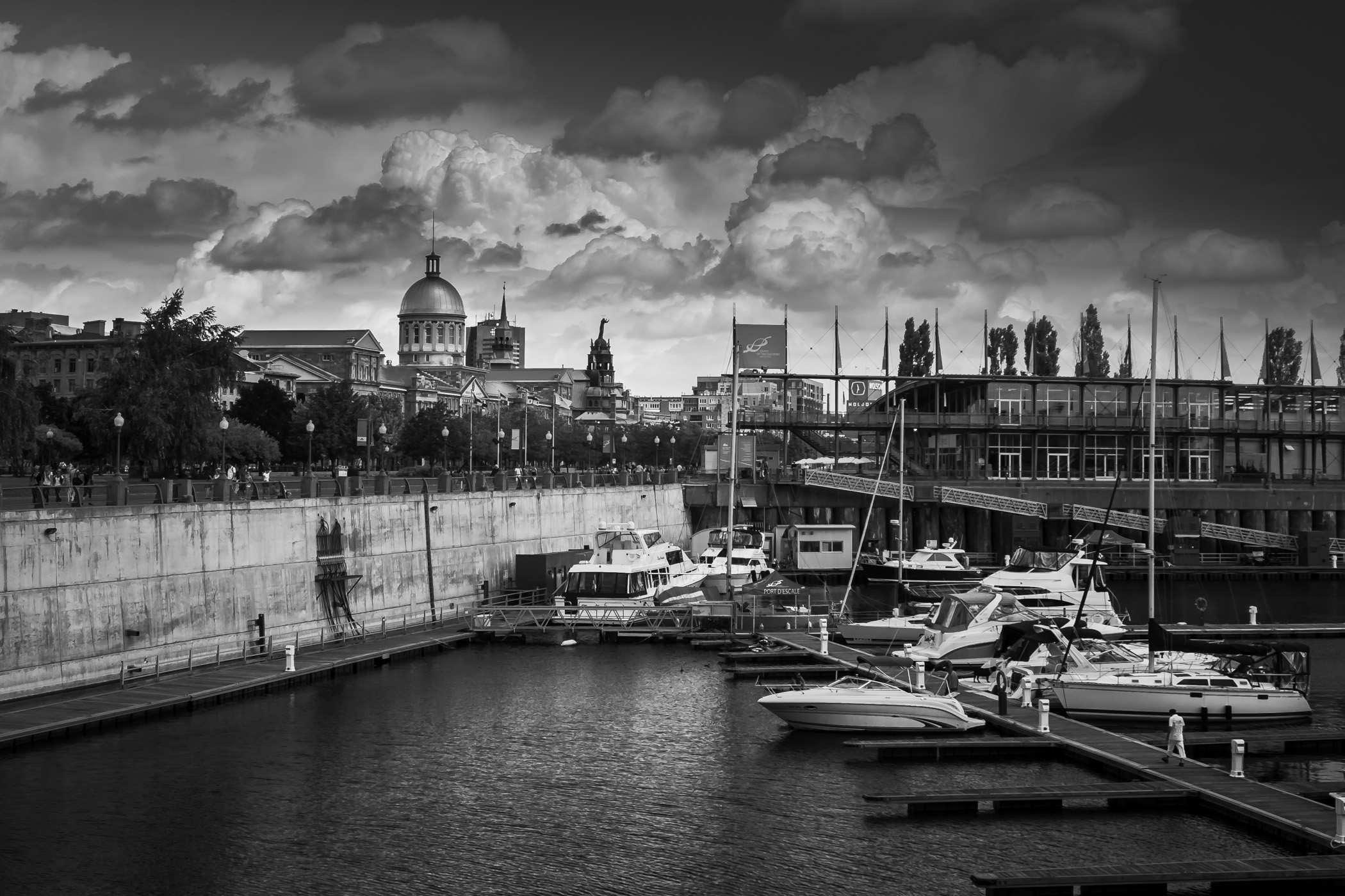 Boats docked along the quays of Vieux Port de Montréal.