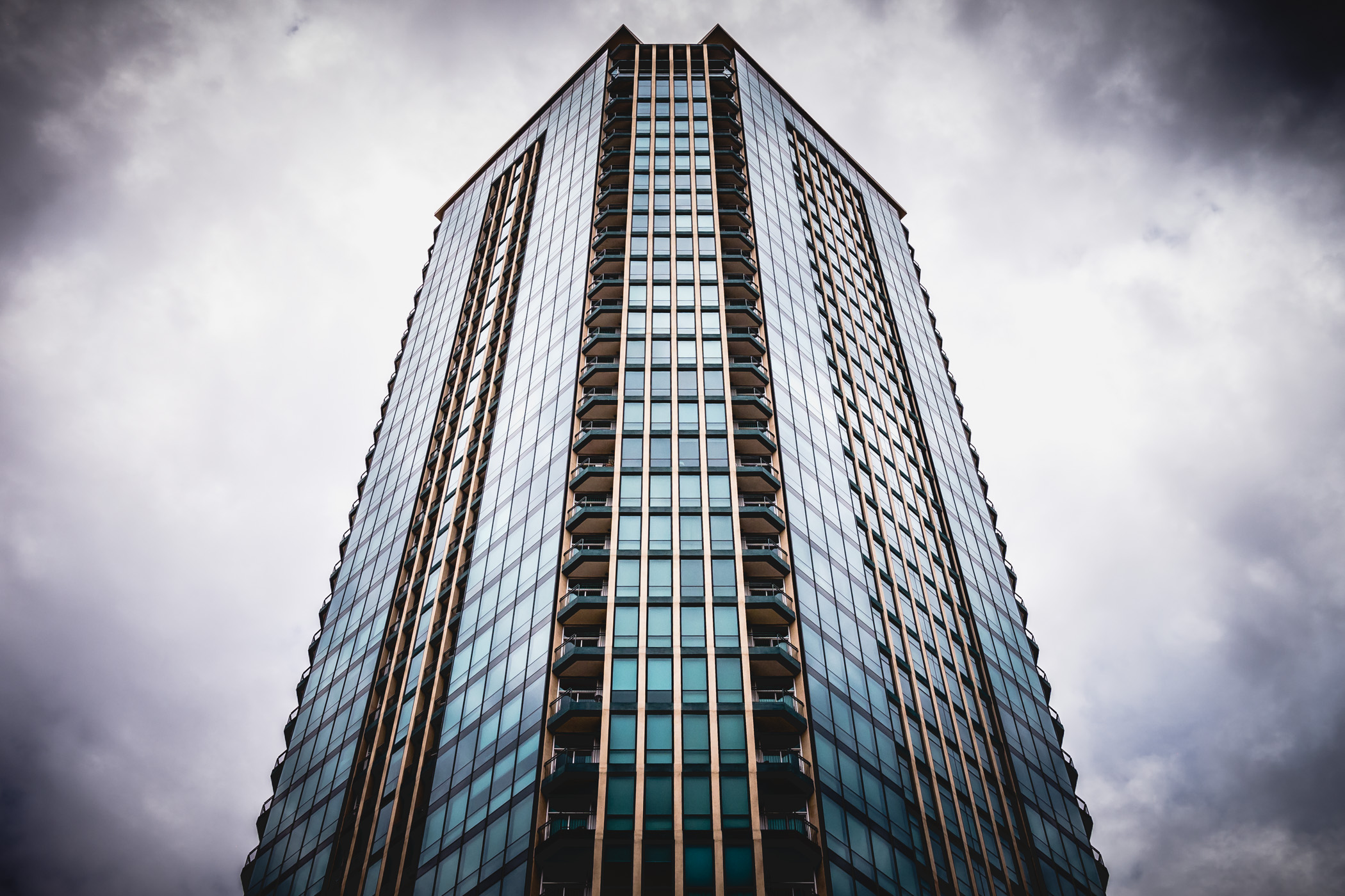 Fort Worth's tallest residential building—The Tower—rises into the cloudy, rain laden North Texas sky. Fort Worth's tallest residential building—The Tower—rises into the cloudy, rain laden North Texas sky.