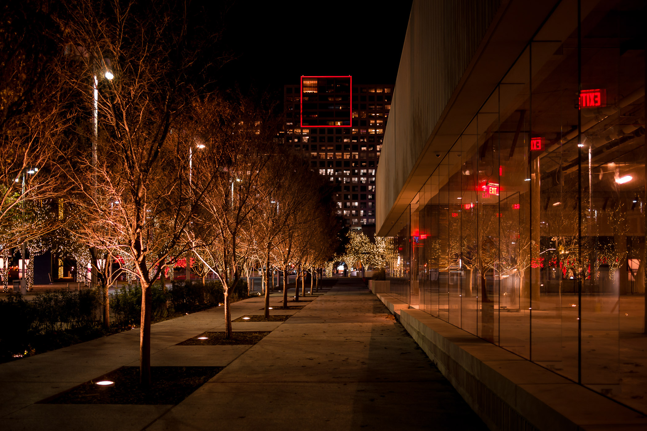 The Dallas Arts District's One Arts Plaza as seen from a sidewalk adjacent to the nearby HALL Arts.