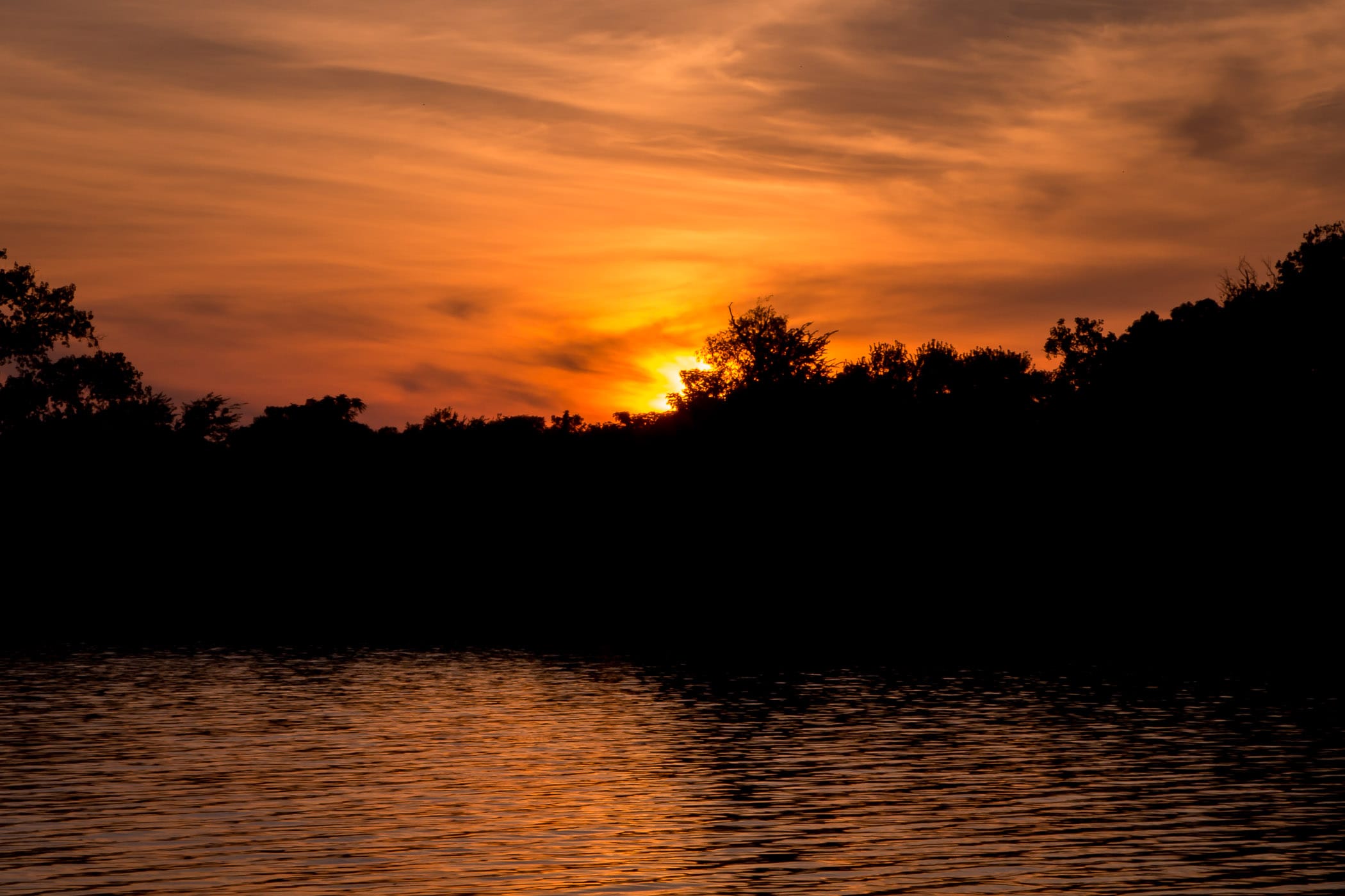 The sun rises on Dallas' White Rock Lake.