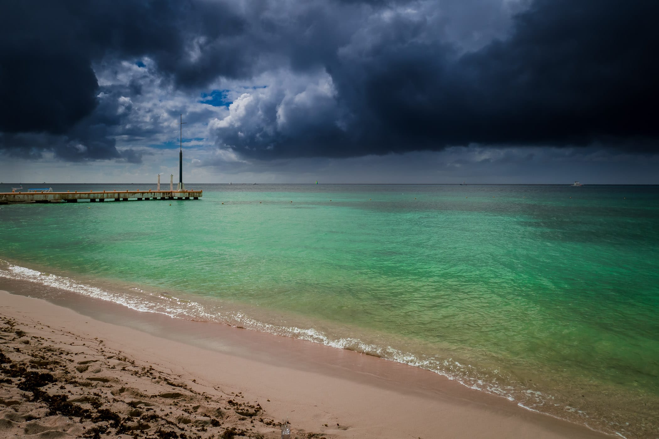Storm clouds roll towards the beach at Cozumel, Mexico's Nachi Cocom Beach Club.