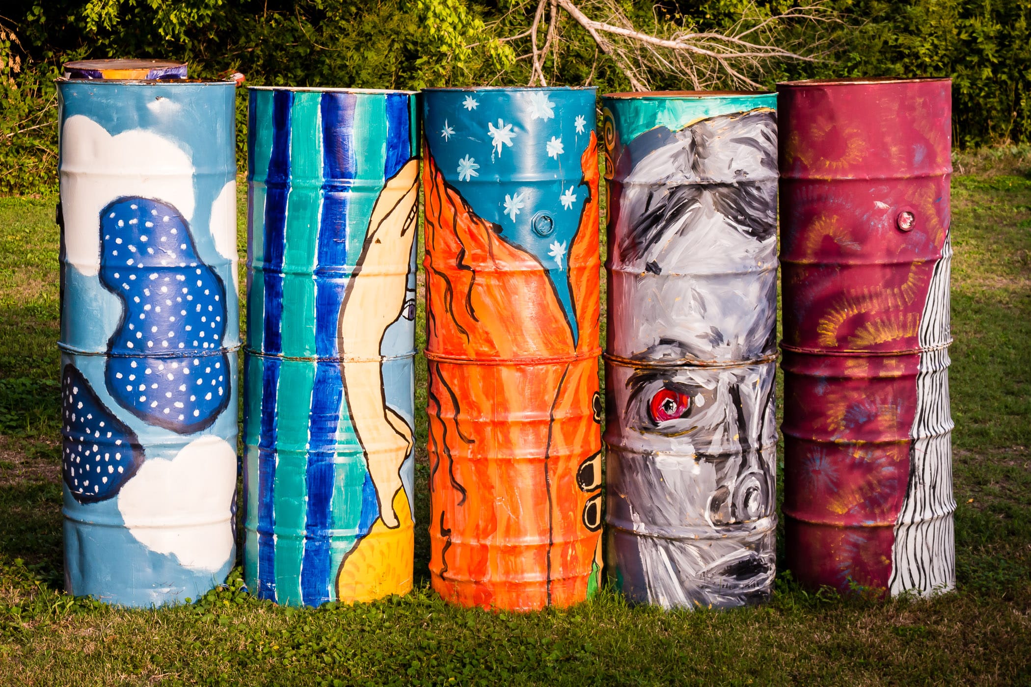 55-gallon drums welded together and painted to make artwork in a Waxahachie, Texas, park.