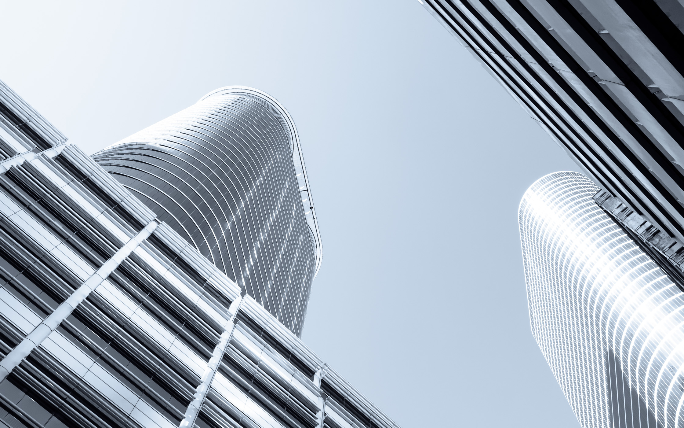 Downtown Houston's 1400 Smith Street and 1500 Louisiana Street skyscrapers, formerly the Enron Center, rise into the sky over Southeast Texas.