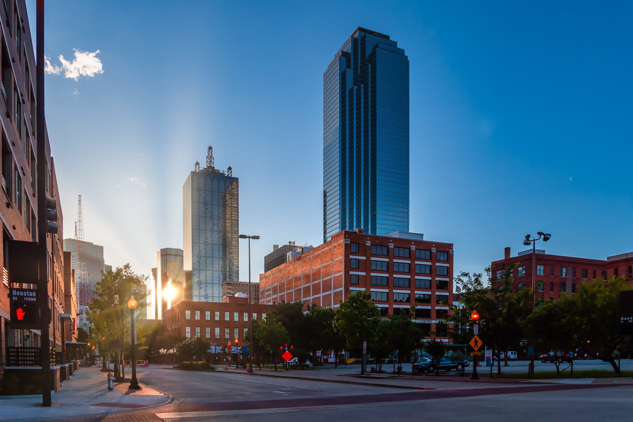 The morning sun glints off Downtown Dallas' LTV Tower as its first light illuminates the city.
