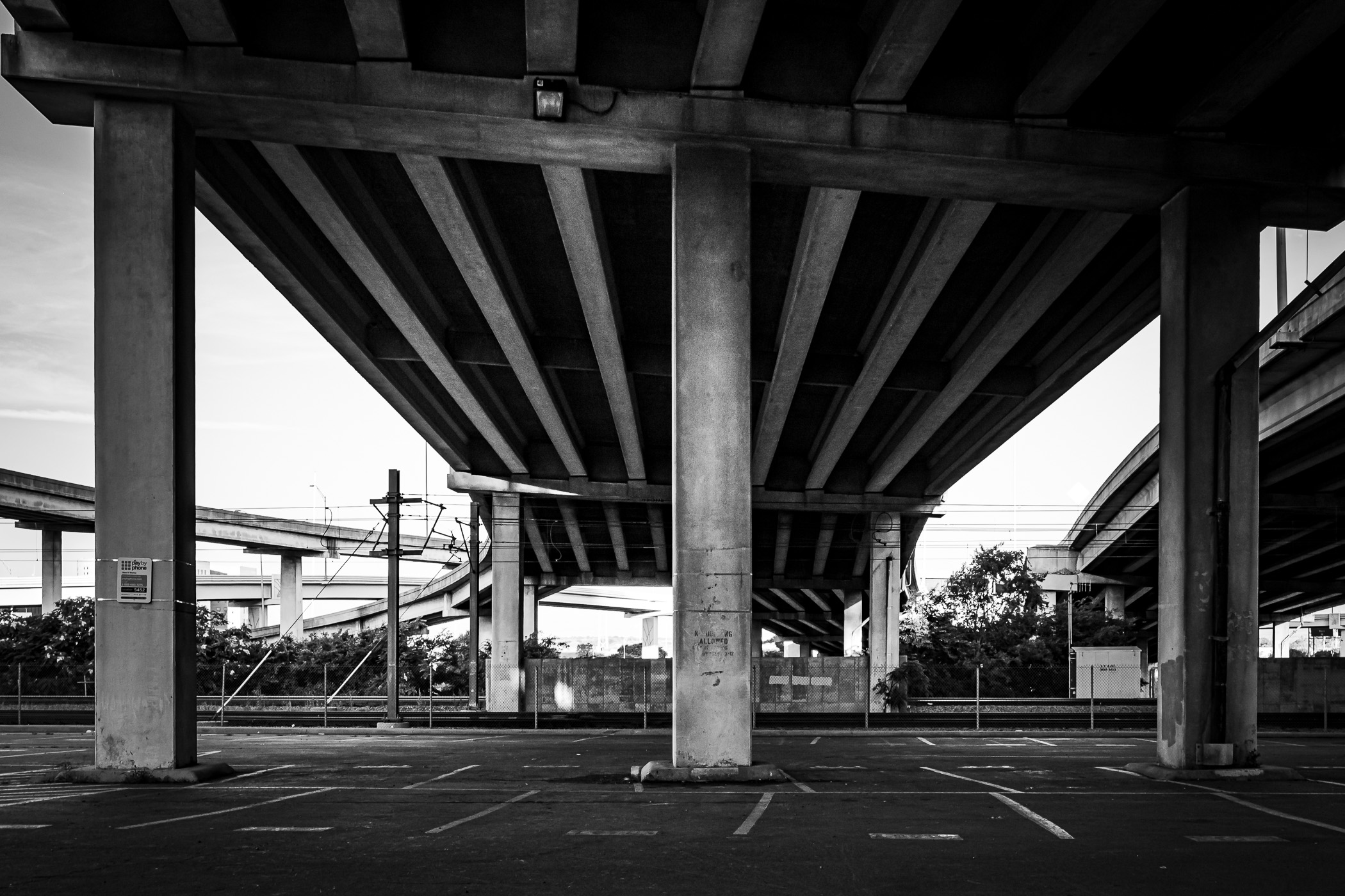 Support columns hold up the main lanes and a ramp of the Woodall Rogers Freeway, Dallas.