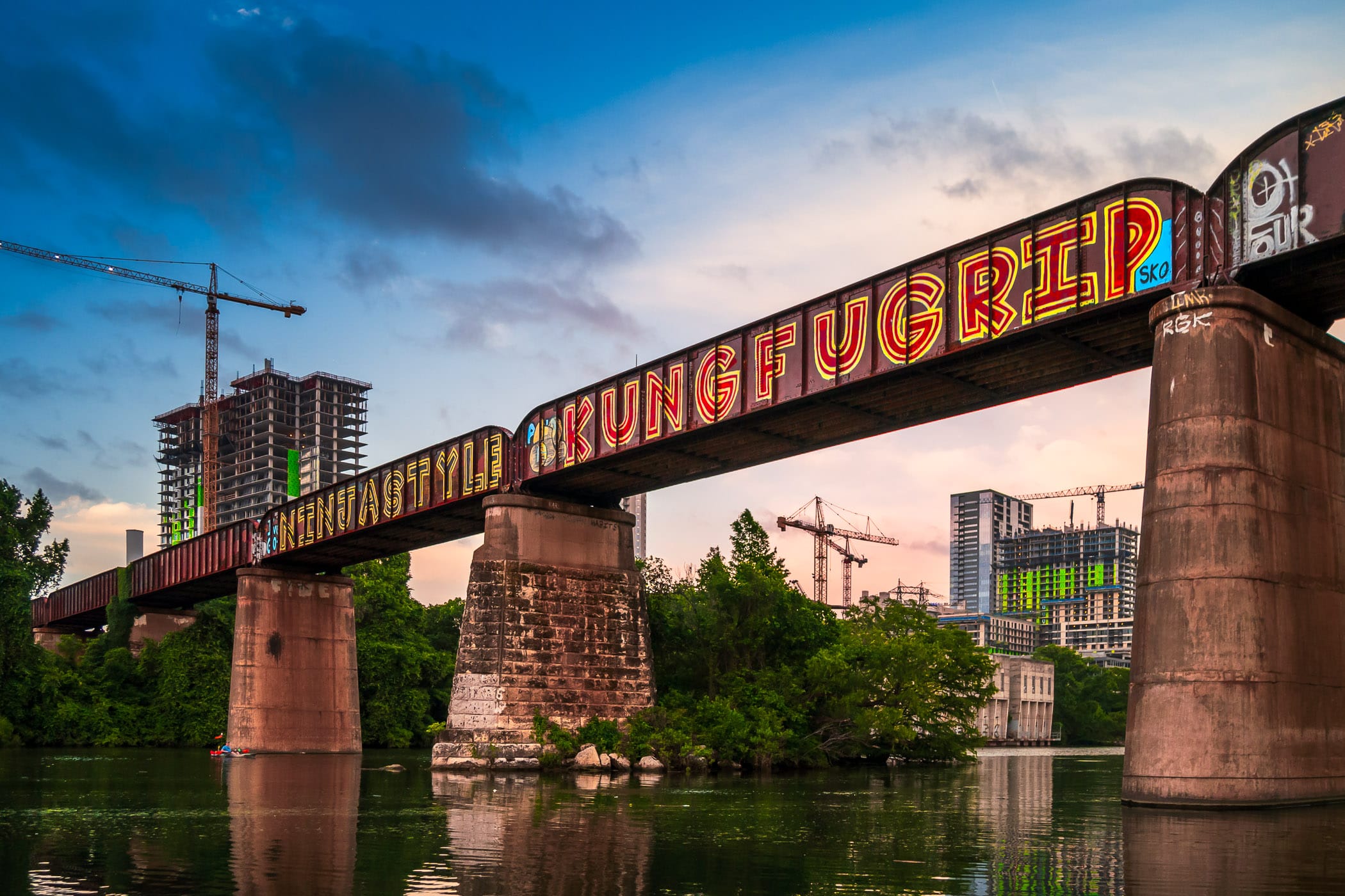 The Missouri-Pacific/Union Pacific Railroad Bridge—built in 1902—spans Lady Bird Lake on the south side of Downtown Austin, Texas.
