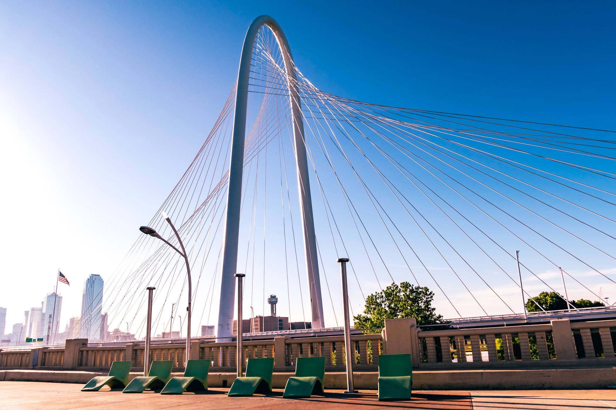 Lounge chairs sit along the Ronald Kirk Bridge park (formerly the Continental Avenue Bridge) in the shadow of Dallas' Margaret Hunt Hill Bridge.